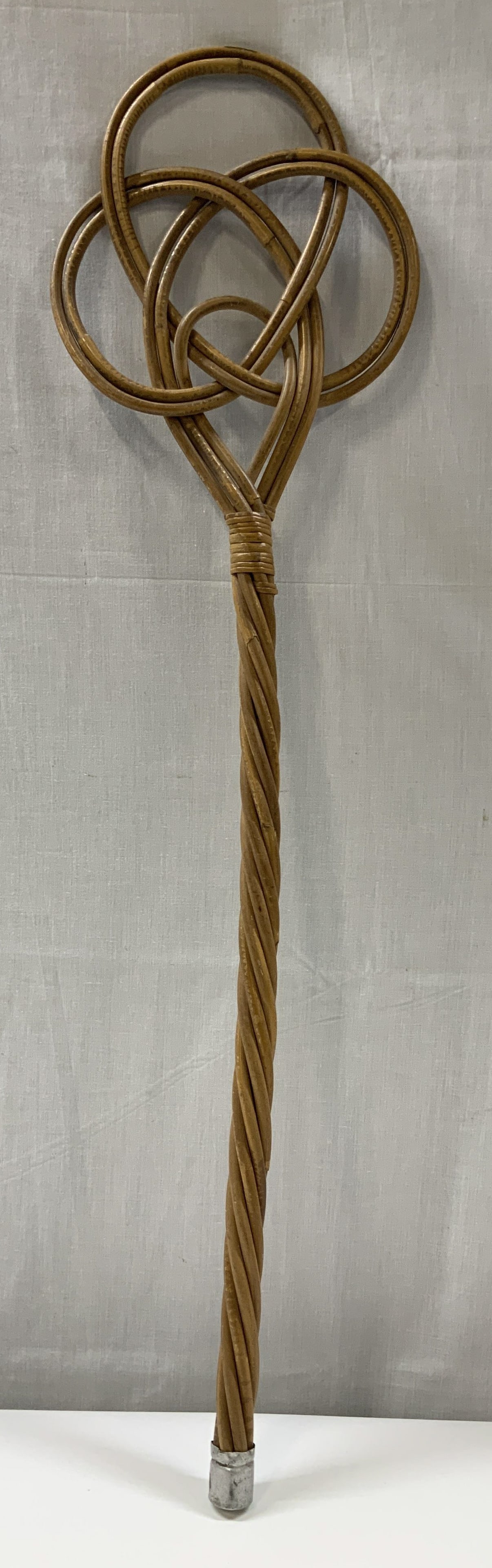 Vtg Rattan Carpet Beater 28.7in: Vintage rattan carpet beater features a stylized head & twisted handle. Silver toned end. No visible signature or markings. Surface wear consistent to age, use & exposure. Measurements: height