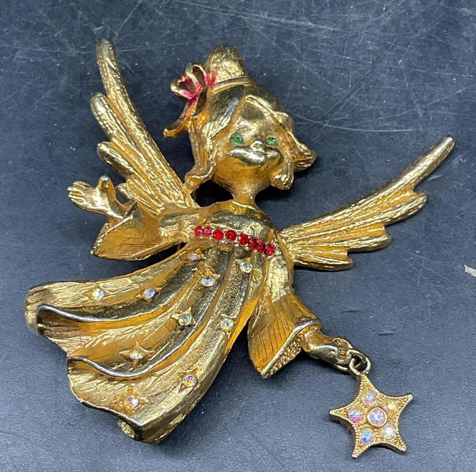 Vintage MYW Gold Tone Crystal Angel Brooch: Vintage signed MYW gold tone angel brooch with crystals. Measures approx. 2 x 2 inches. Some scratching. Jewelry, estate jewelry, costume jewelry, fashion jewelry, cocktail jewelry, accessories,