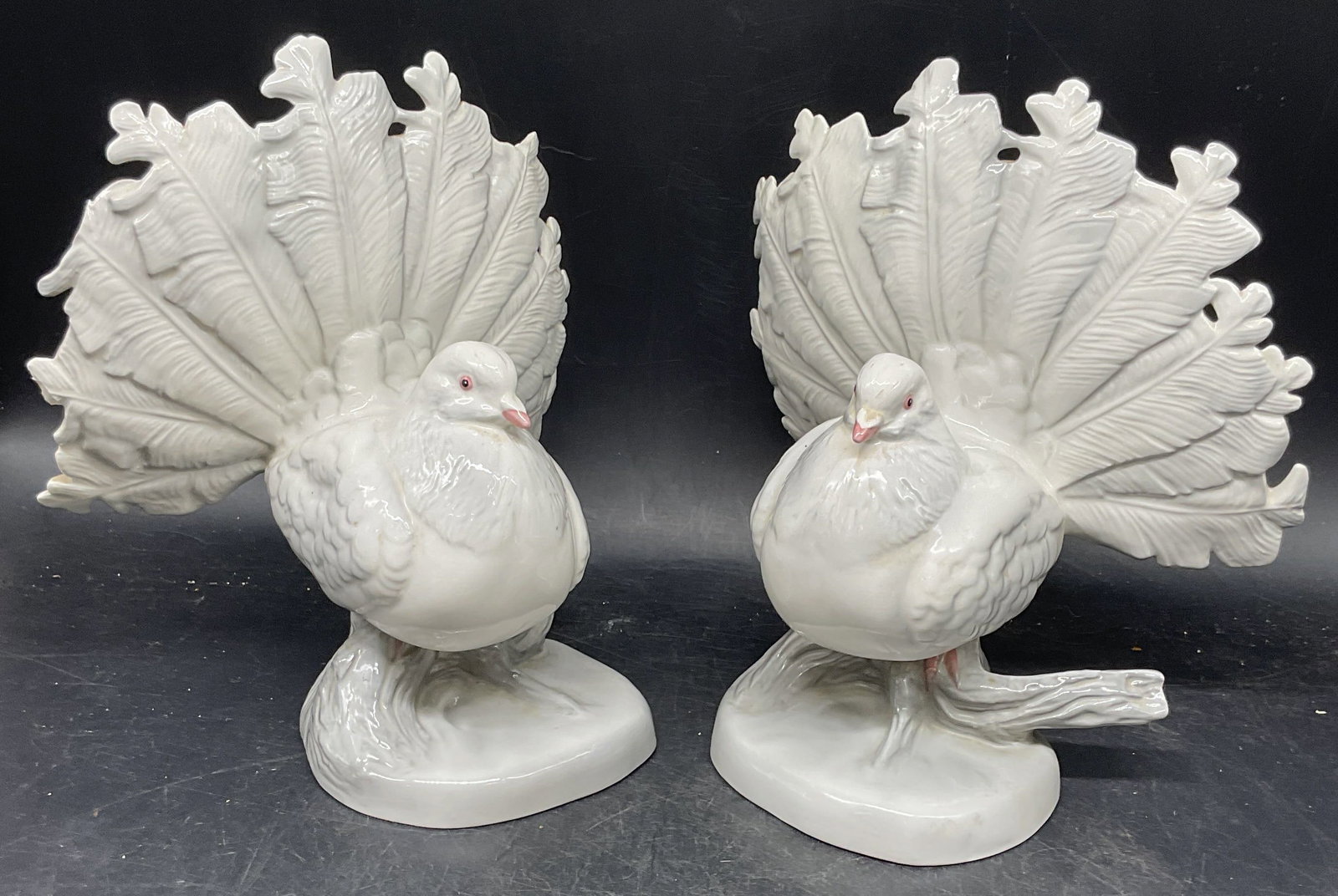 Pair Florence Ceramic Dove Figurines, USA: Pair of vintage signed Florence Ceramics hand painted dove figurines. Marked Pasadena, California. Made in USA. Measures approx. 7.5 x 6.5 x 8.25 inches. Some chipping and scratching to each piece. Fl