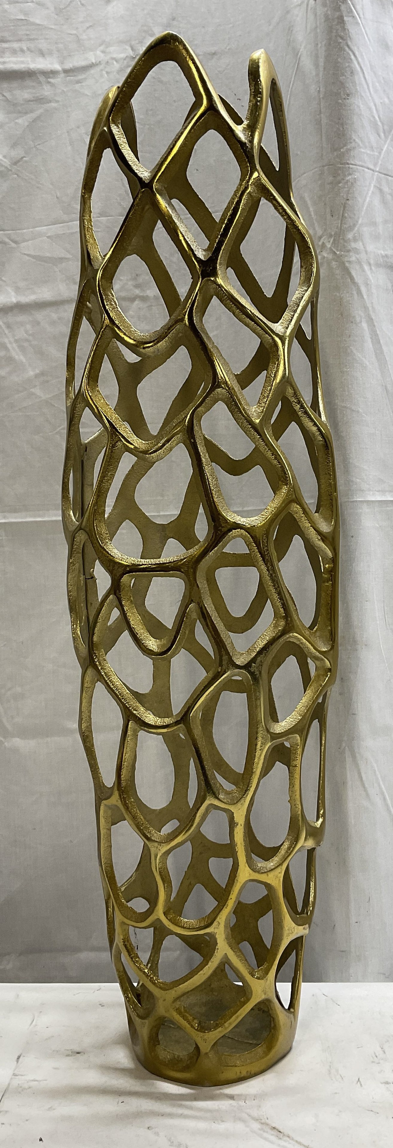 30in Gold-Tnd Metal Coral Cutout Design Vase: Tall Gold-Toned Metal Coral Cutout Design Vase. Condition Consistent with Exposure. Measures app 30in H x 5in L. Tall Vase, Gold Toned Vase, Metal Vase, Coral Cutout Design, Coral, Ocean Inspired,