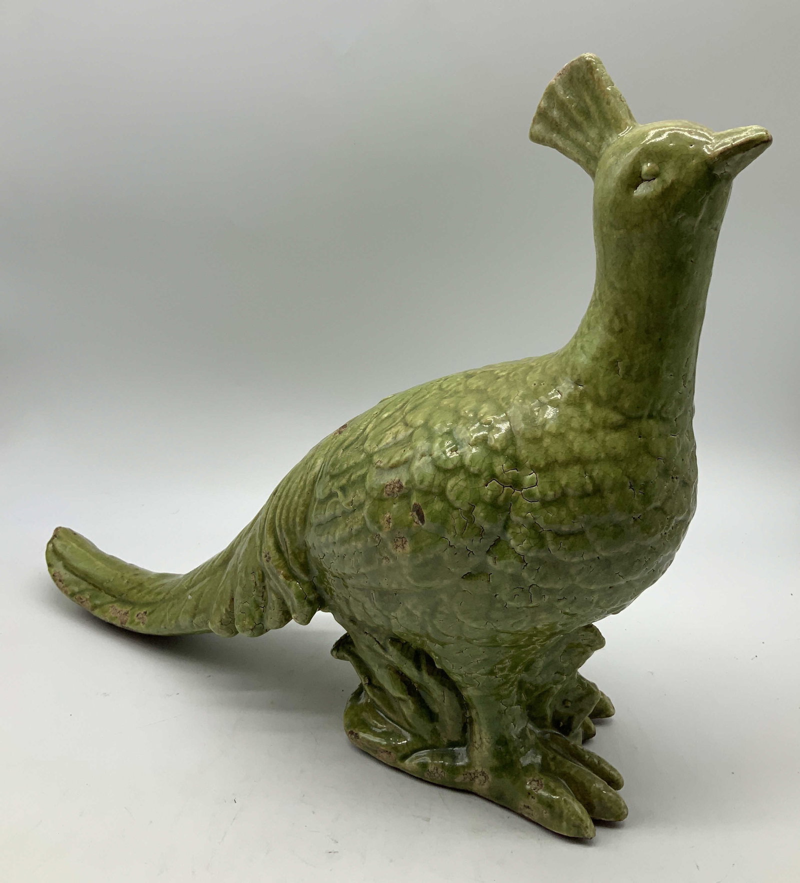 Vtg Green Ceramic Bird Figurine: Vintage ceramic bird figurine features a green glossy glaze. Upright position & detailed feather textures. Surface wear consistent to age, use & exposure. No visible signature or markings.