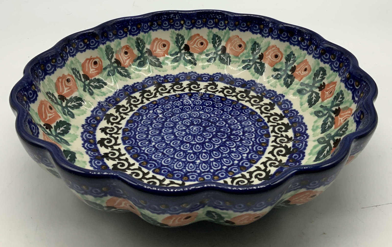Ceramika Artystyczna Hand Made Bowl POLAND: Ceramika Artystyczna bowl features a scalloped rim & hand painted floral motifs. Geometric accents. Surface wear consistent to age, use & exposure. Signed & marked on underside. Reads, Ceramika Artyst