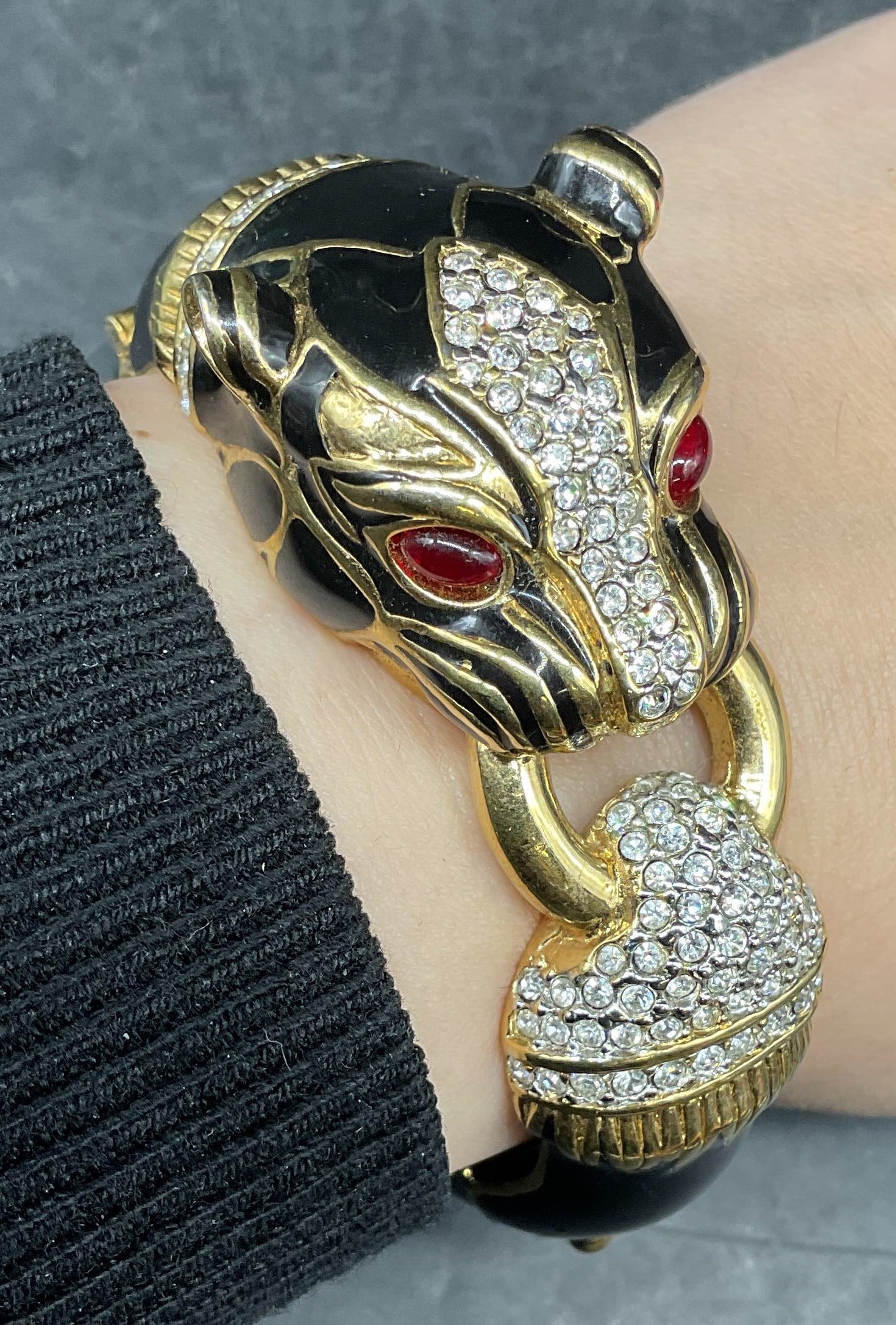 Vintage Enamel Crystal Panther Bracelet: Vintage gold tone black enamel and crystal decorated panther hinged bangle bracelet. Measures approx. 2.25 inches wide. Some scratching. One crystal needs replacement. Jewelry, estate jewelry, costume