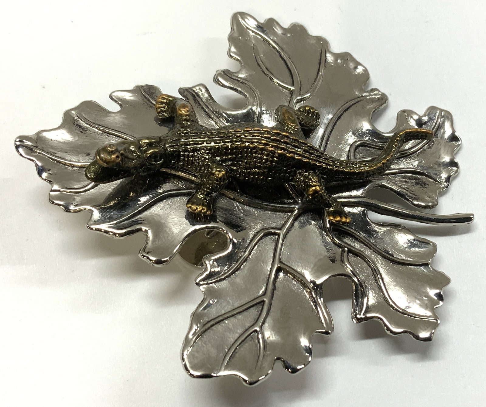 Vtg Sylvia Dahl Alligator W Maple Leaf Clip: Vintage Sylvia Dahl alligator on maple leaf clip. Silver & copped like toned. Intricate detailing. Surface wear consistent to age, use & exposure. Measurements: length 3in x width 2.7in. Vintage Sylvi