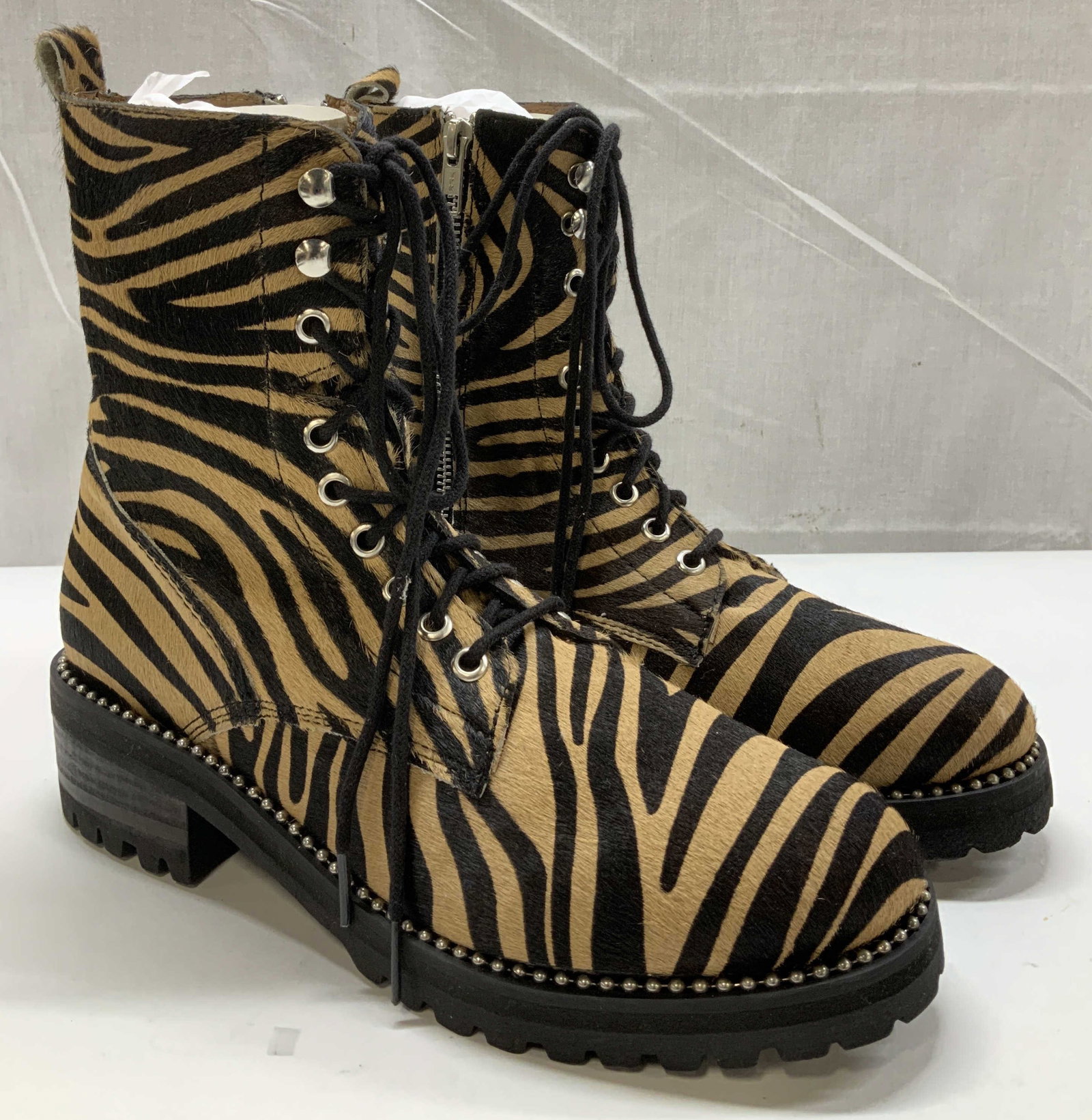 Aqua Jax Studded & Real Fur Combat Boots MEXICO: Real fur, printed cow hair. Composed of pieces of fur. Size 9 1/2. Aqua Jax womens studded hiker combat boots. Rubber outsoles. Signed & marked. Reads, Made in Mexico. Surface wear consistent to age, 