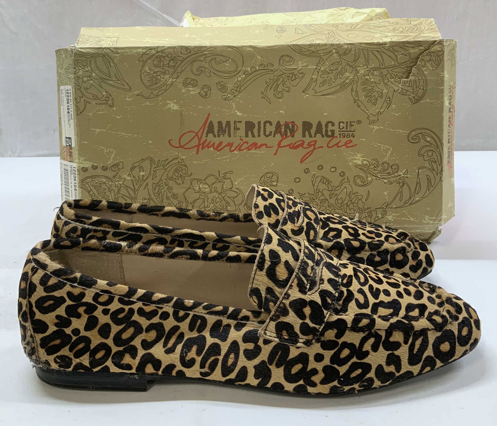 American Rag Cammie Calf Hair Loafers W Box: American Rag Cammie calf hair penny loafers featuring a leopard design. Man made. Comes with original box. Dyed calf fur. Surface wear consistent to age, use & exposure. Measurements: size 10M. Americ