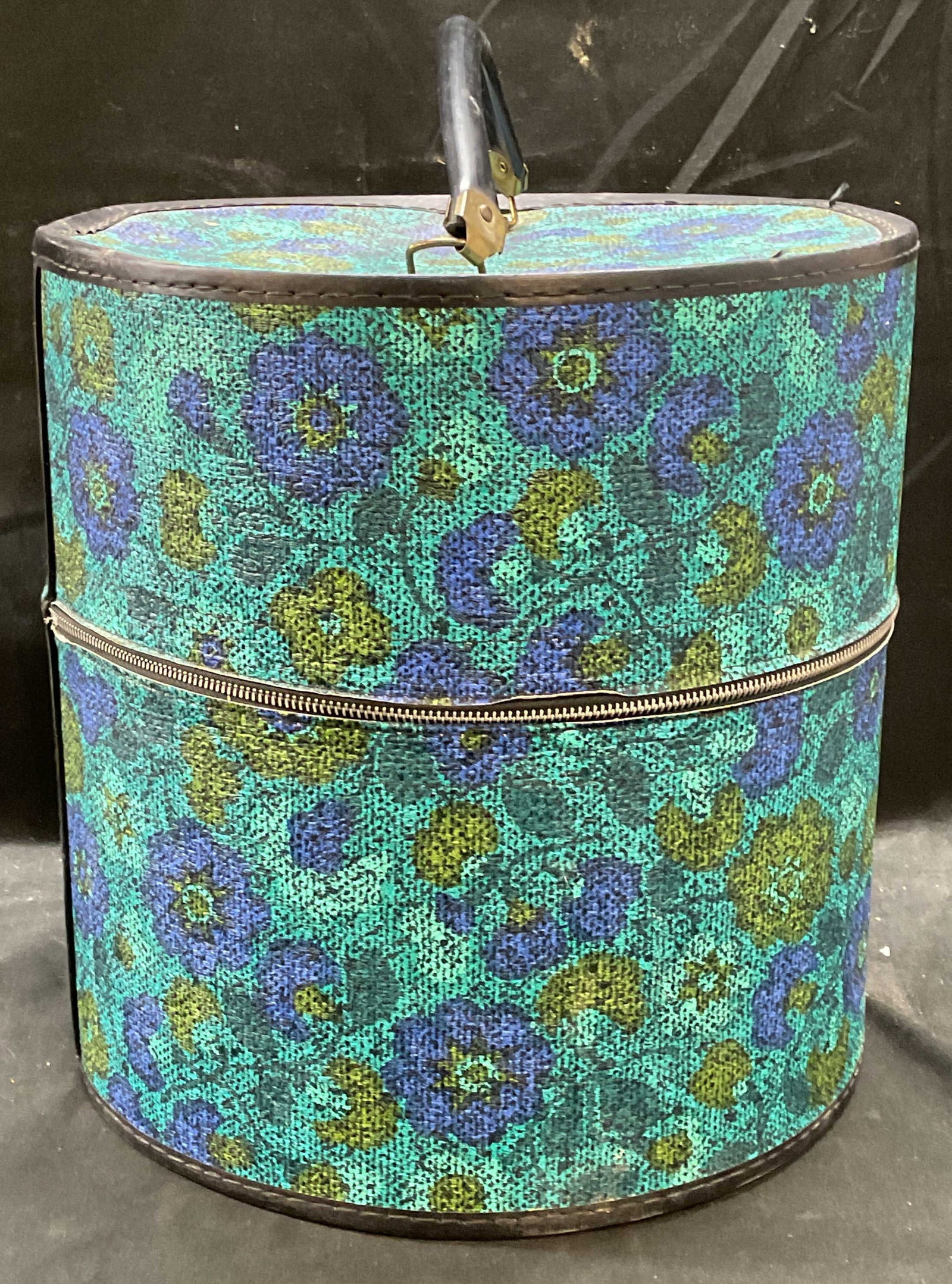 Vintage Blue Floral Faux Leather Round Hat Box: Vintage blue floral print faux leather round hat box. Red and white floral lined interior. Top handle. Measures approx. 13 x 13 inches. Wear including residue and scratching. Hat box, vintage hat box,