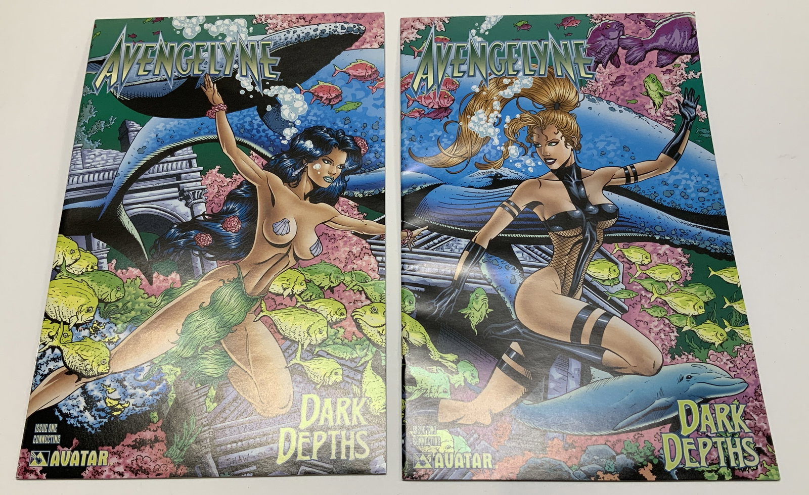 Lot 2 2000 Avengelyne Dark Depths #1 & 2 Comic Bk: Lot includes, Avengelyne: Dark Depths #1 & #2. Connecting set. 2000. Comics feature illustrations. Surface wear consistent to age, use & exposure. Measurements: length 10.1in x width 6.6in. 2000 Aveng