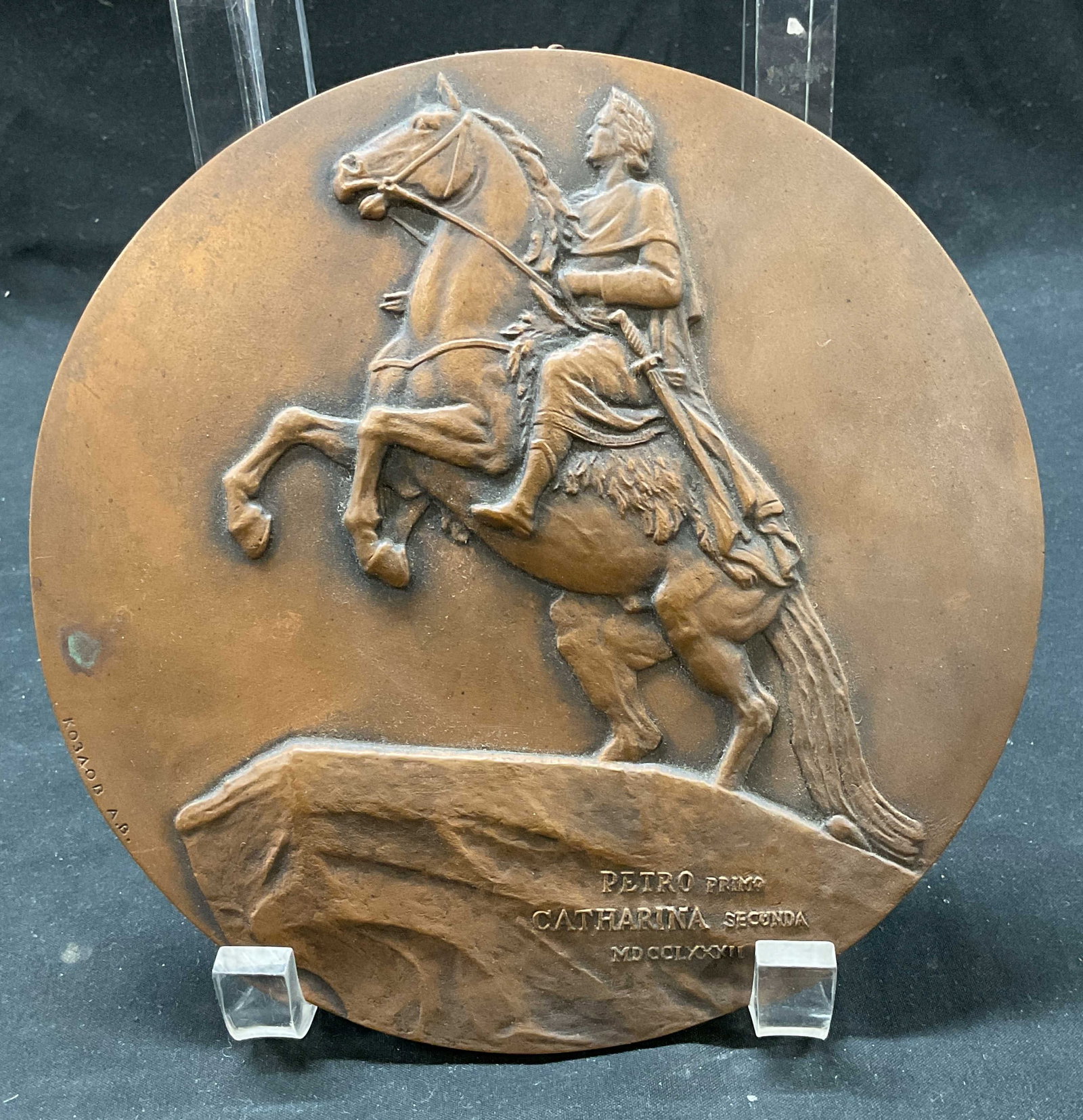 Vintage Petro Primo Horseman Wall Plaque: Vintage Petro Primo Catharina Secunda bronze horseman motif wall plaque. Measures approx. 6.75 inches wide. Some patina scratching. Bronze plaque, horse n plaque, equestrian plaque, home decor, home