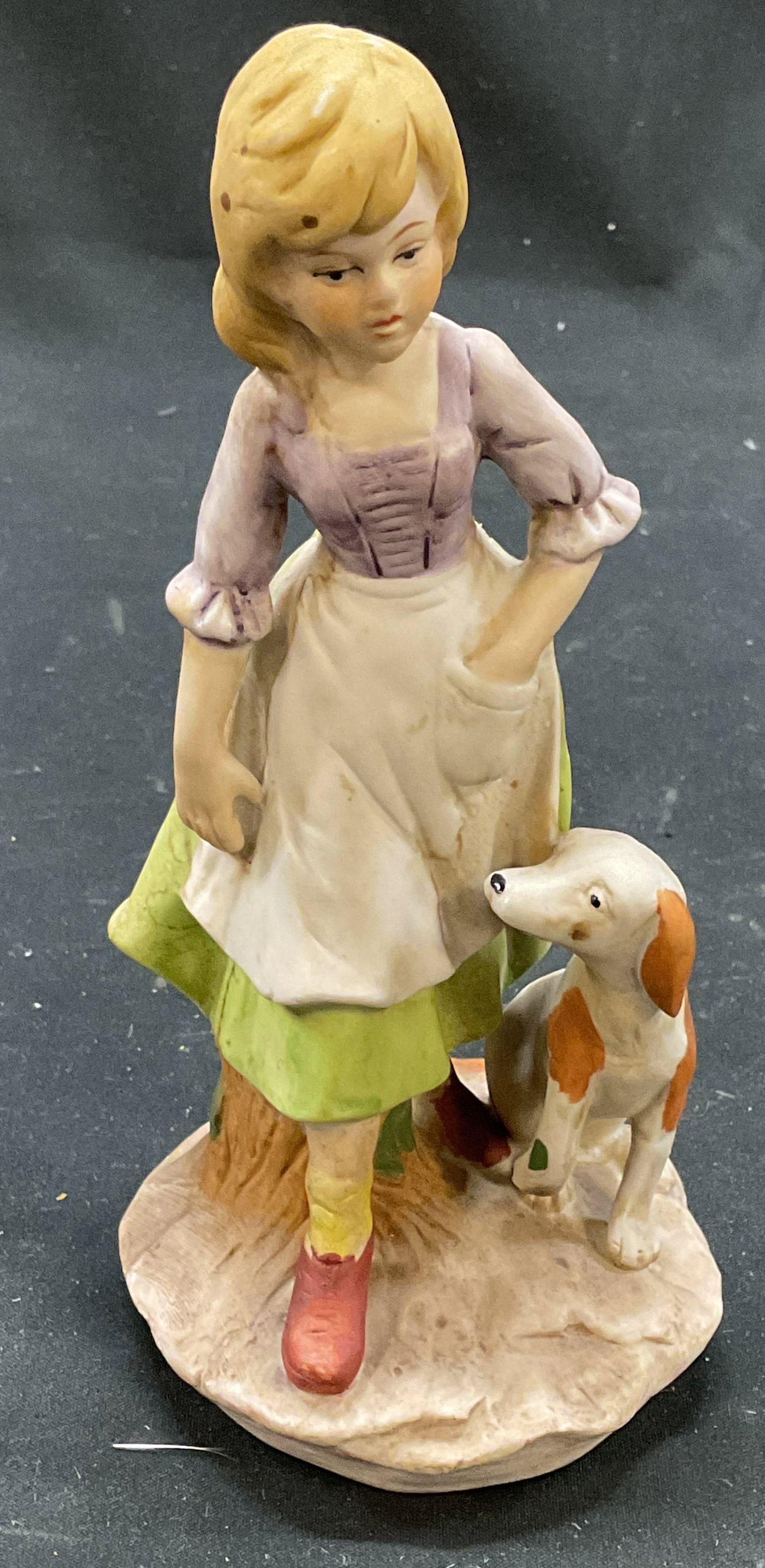 Capodimonte Porcelain Girl & Dog Figurine: Capodimonte porcelain figurine depicting a girl with dog. Hand painted. Measures approx. 3 x 6.5 inches. Some scratching. Capodimonte figurine, porcelain figurine, girl figurine, home decor, home acce