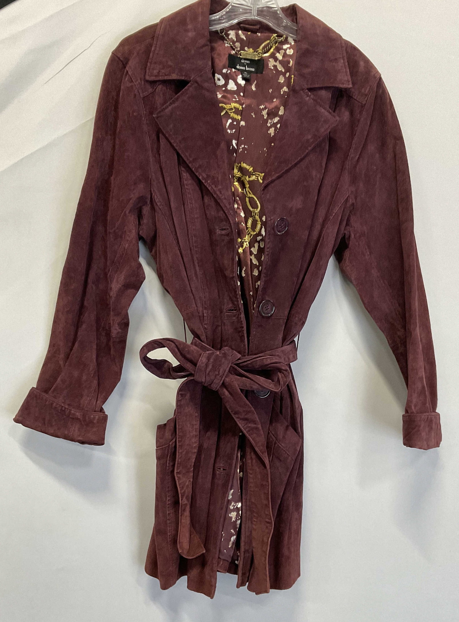 Dennis by Dennis Basso Maroon Gen Suede Jacket: Dennis by Dennis Basso Maroon Genuine Suede Jacket. Maroon Lining with Animal Print and Gold Toned Chain Design. Size XL. Tag Reads Shell: 100% Genuine Leather Lining: 100% Polyester. Some Fading and