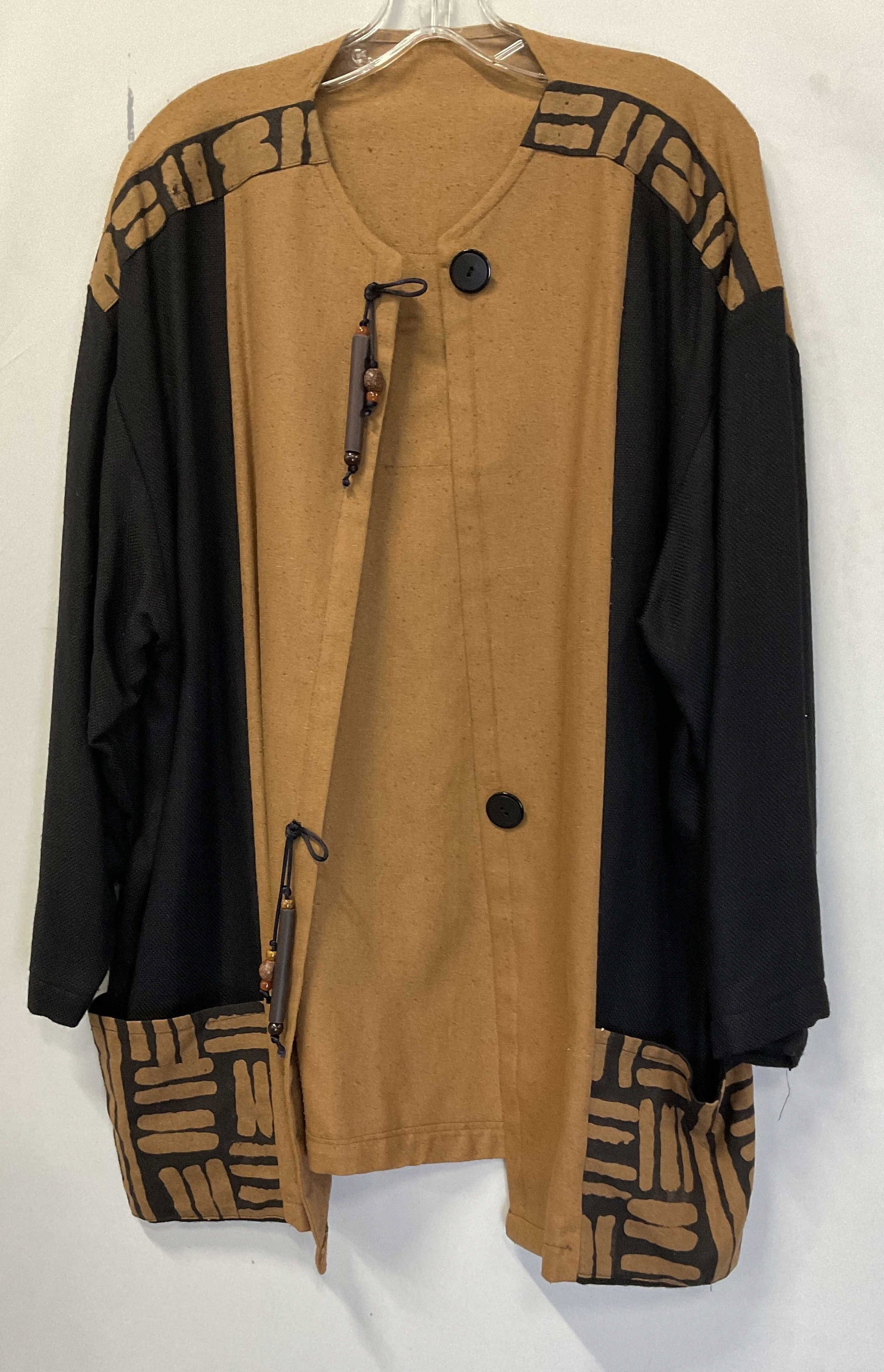 VTG Handmade Black & Brown Abstract Jacket: Vintage Handmade Black & Brown Abstract Pattern Jacket. Linen and Cotton. Beaded Accents. No Visible Size or Brand. Surface Wear Present. Chest Measures app 20in. Vintage Jackets, Tunic Jacket, Black