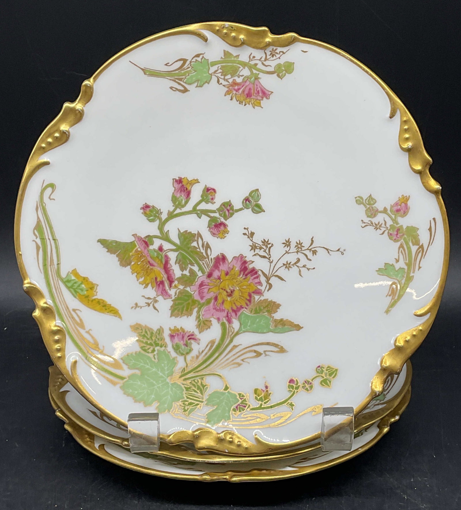 3 Antq Pouyat Limoges Floral Porc Plates France: Set of 3 antique JPL J Pouyat Limoges porcelain plates. Made in France. Circa 1906. Gilt and hand painted floral design. Measures approx. 7.5 inches wide. Some scratching and loss to paint. Antiques, 