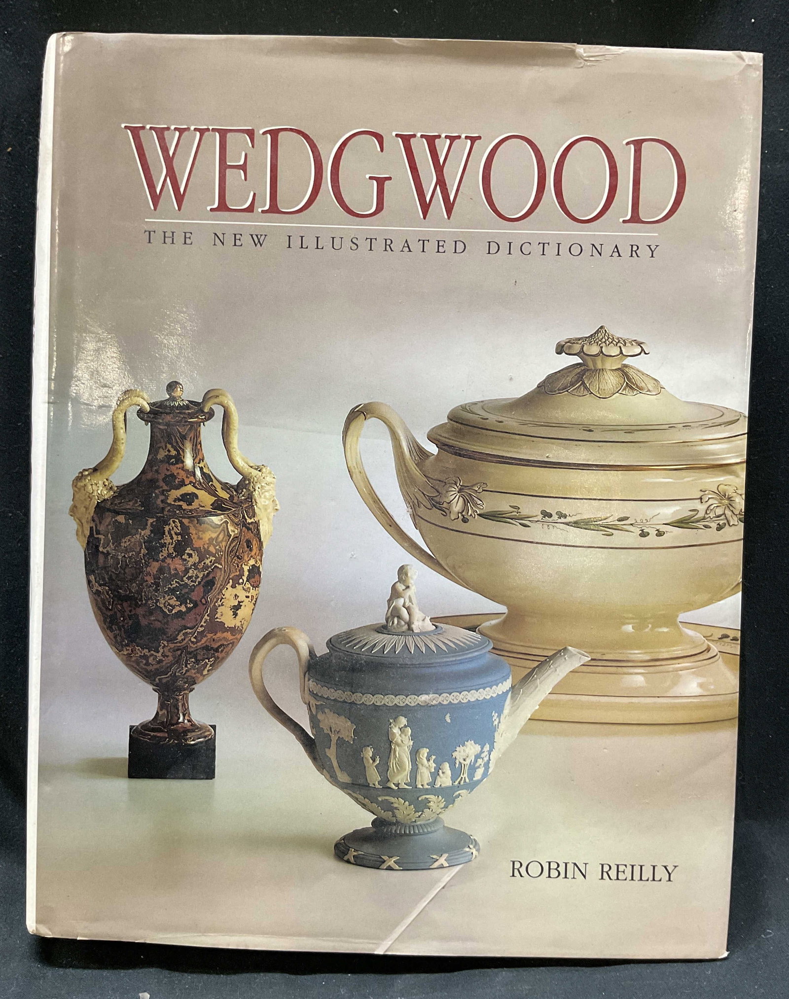 1995 Wedgwood Illus Dictionary Bk Reilly+: Wedgwood The New Illustrated Dictionary by Robin Reilly. Published by Antique Collectors Club, 1995. Hard cover book with illustrated cover. Contains illustrations. Measures approx 9 x 11 inches. Some