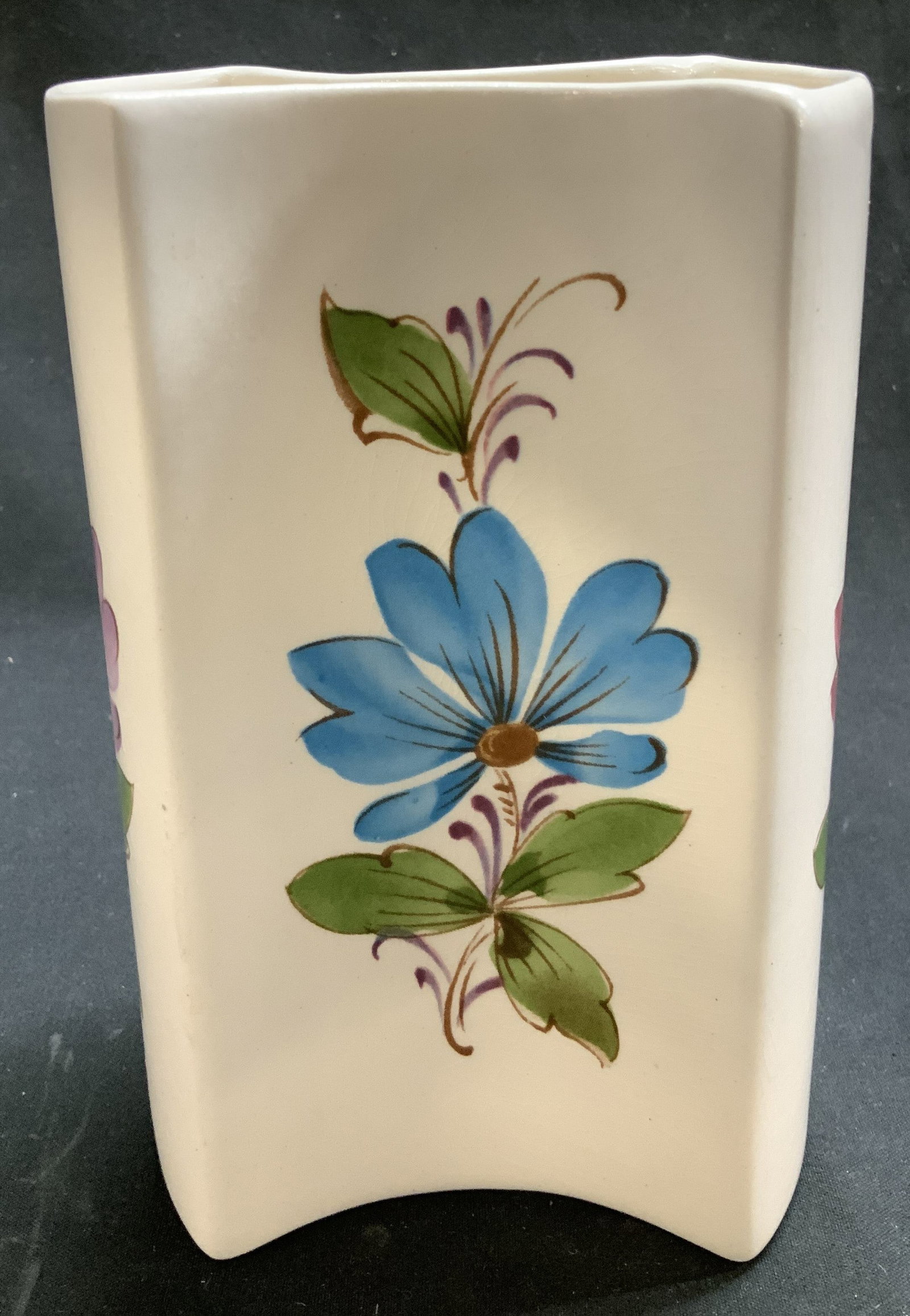 Vtg FTD Handmade Floral Vase PORTUGAL: Vintage FTD handmade ceramic vase features hand painted blue, red, yellow & purple motifs. Signed & marked on underside. Reads, HAND MADE IN PORTUGAL. SADO FTD. FLORISTS TRANSWORLD DELIVERY. Surface w