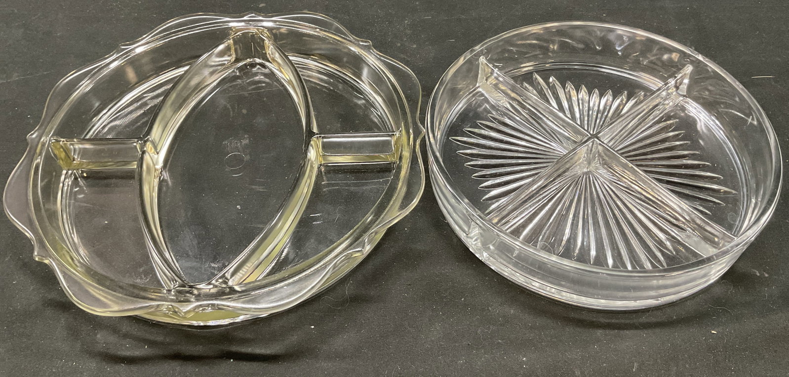 Lot 2 Vintage Glass Divided Candy Dishes: Lot of 2 vintage glass divided candy dishes. Round dishes and scalloped edges. Divided into multiple sections. Starburst design on underside. Thick walled. Largest measures approx 9.5 x 9.5 x 1.5 inch