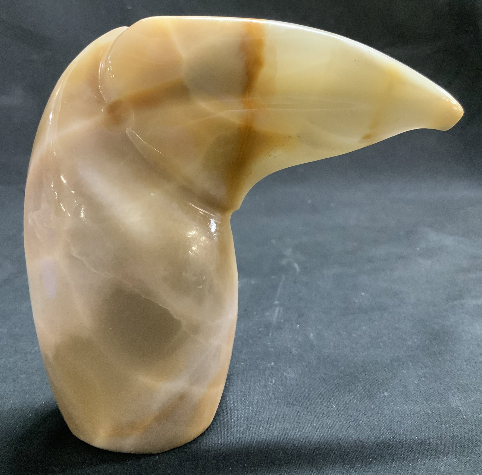Vtg Toucan Bird Stone Figurine: Vintage stone figurine depicting a toucan bird. Oversized beak. Light toned. No visible signature or markings. Surface wear consistent to age, use & exposure. Measurements to beak 4.5in x width 1.6in 