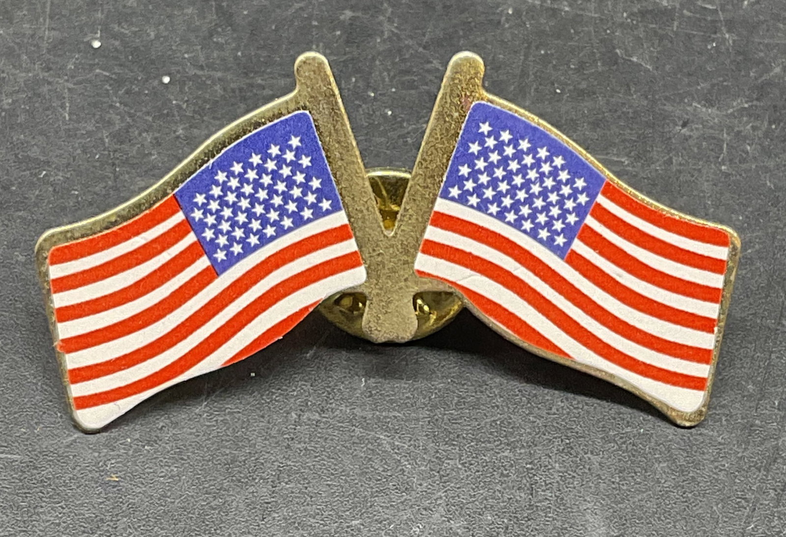 Gold Tone Double American Flag Pin: Gold tone double American flag pin. Measures approx. 1 x 1.5 inches. Some scratching. Jewelry, estate jewelry, costume jewelry, cocktail jewelry, fashion jewelry, accessories, fashion accessories, wea