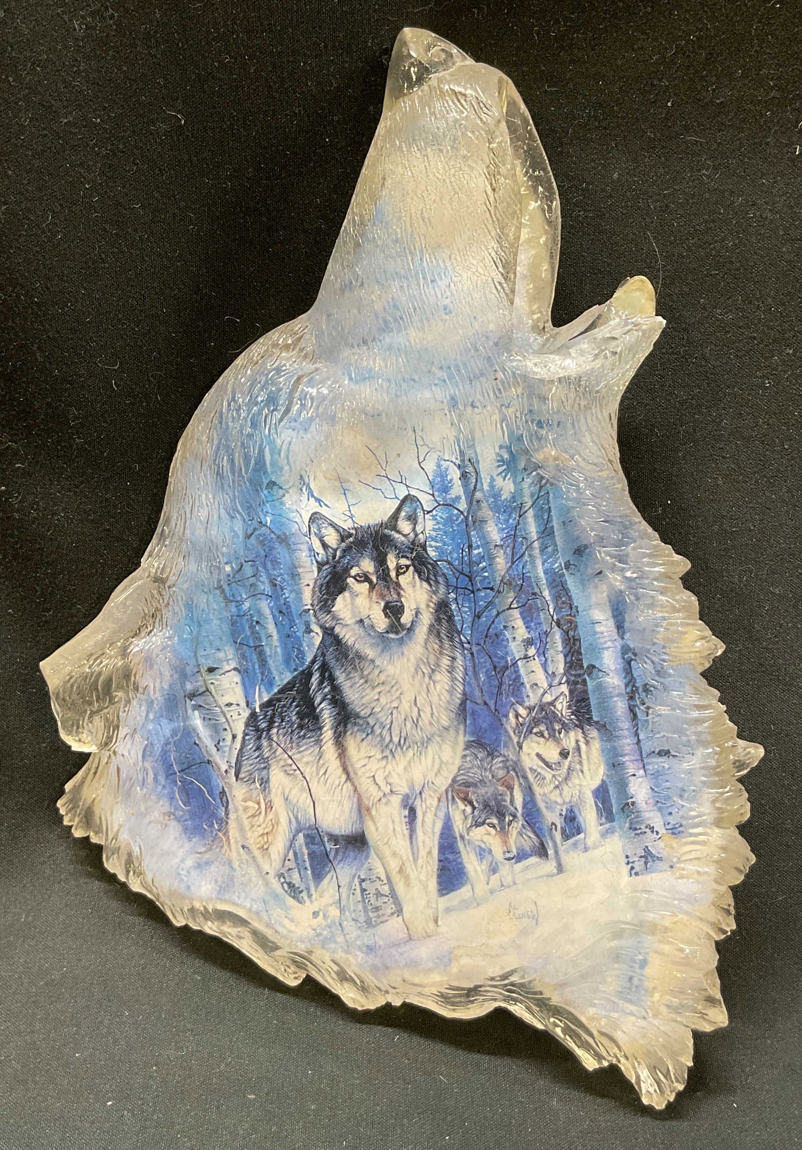Bradford Exchange Decorative Wolf Wall Plaque: Bradford Exchange decorative wolf wall plaque. Marked on backside, photographed here, most reads illegible. Hand blown glass of a wolf figure howling. Imagery of wolves in a forest. Varying colors. Wa