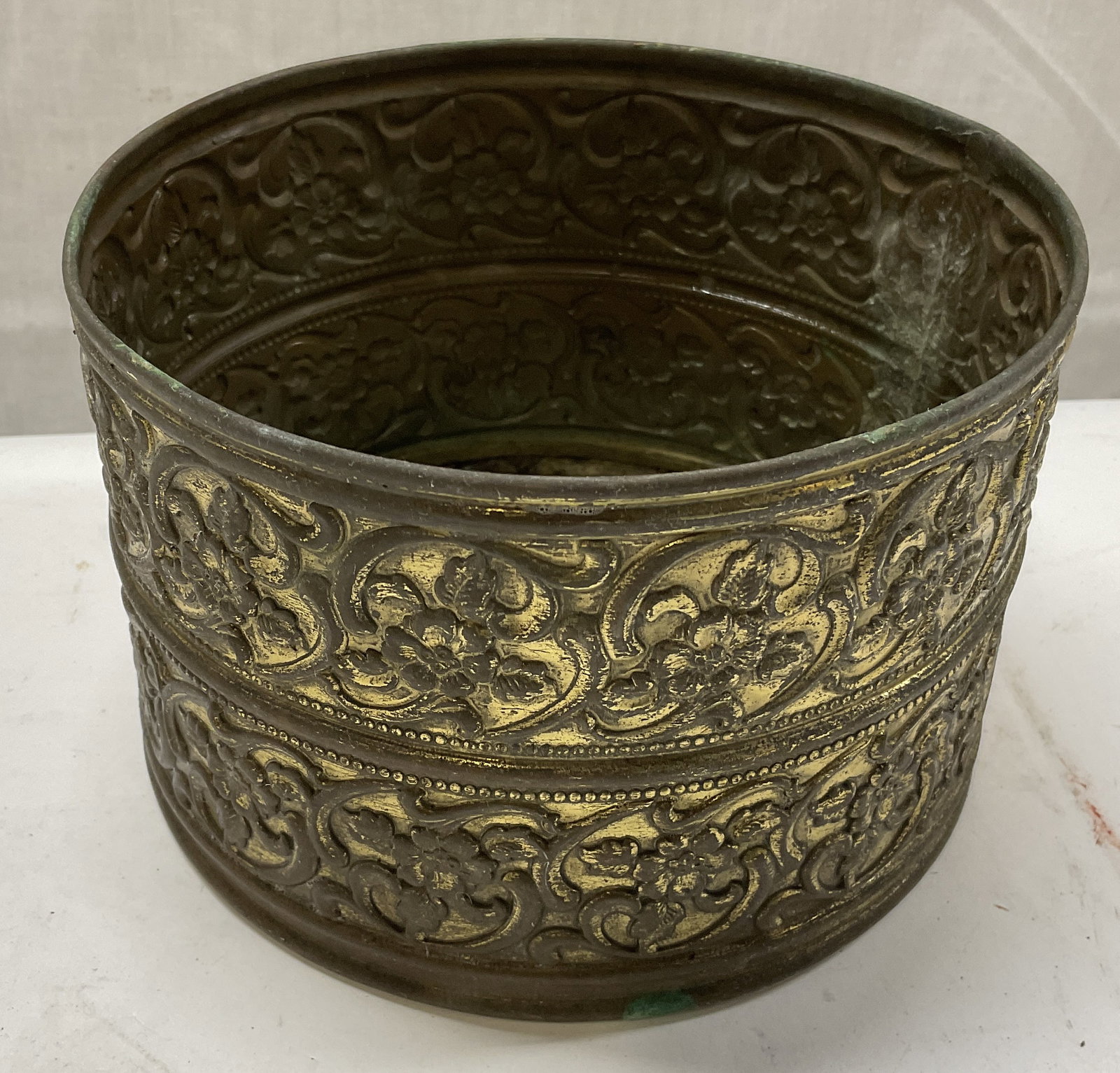 VTG Brass Floral Engraved Planter: Vintage Brass Floral Engraved Planter. Green Patina and Scratching Consistent with Exposure. Measures app 4in H x 5.75in Diameter. Vintage Brass, Brass Planter, Floral Design, Engraved Metal, Engraved