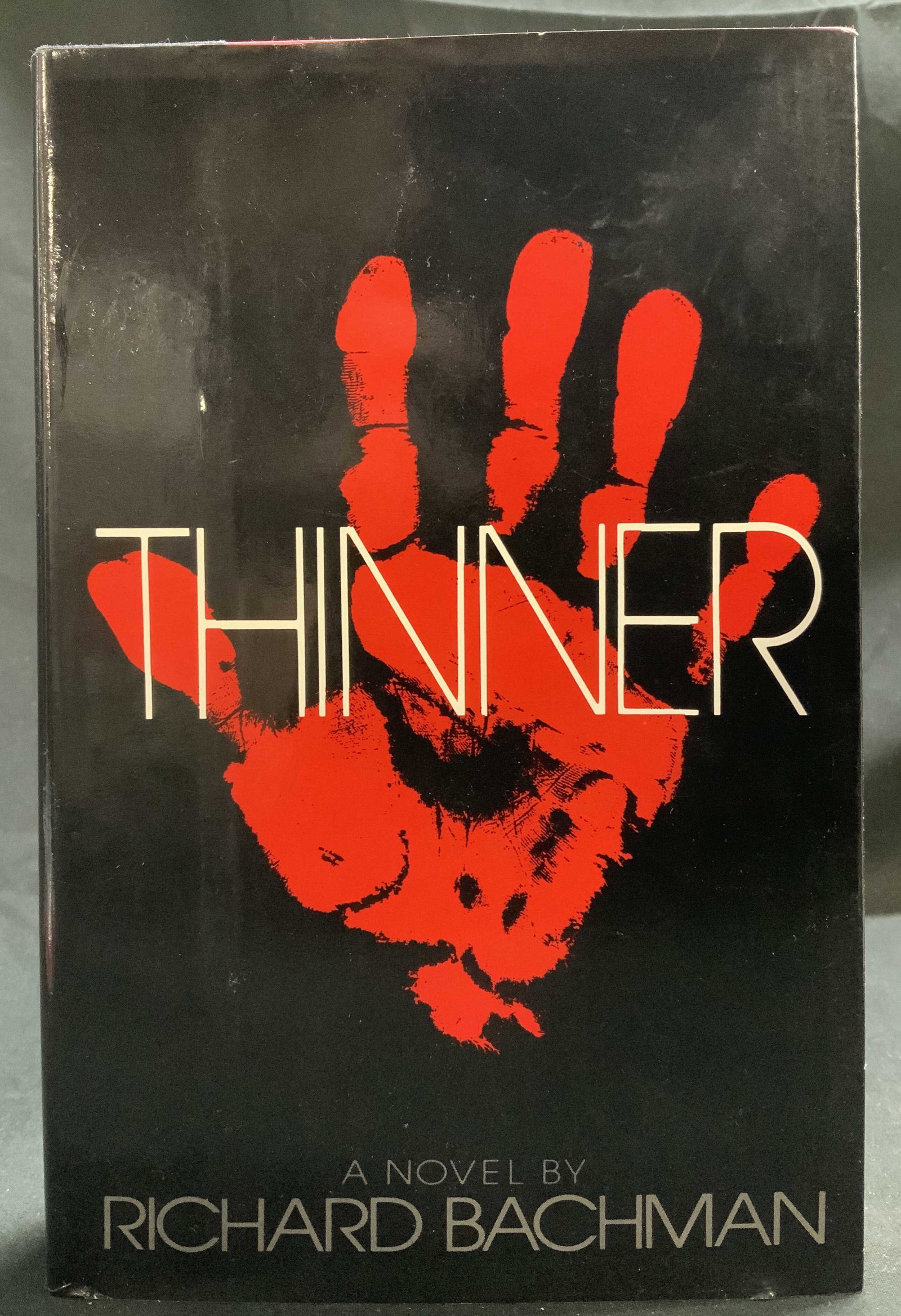 1984 Thinner 1st Print Typo Novel BACHMAN: Thinner by Richard Bachman. Nal Books. New American Library. Times Mirror. New York & Scarborough, Ontario. Copyright 1984. First printing. Printed in the USA. Novel. Typo on page 142, softy should be