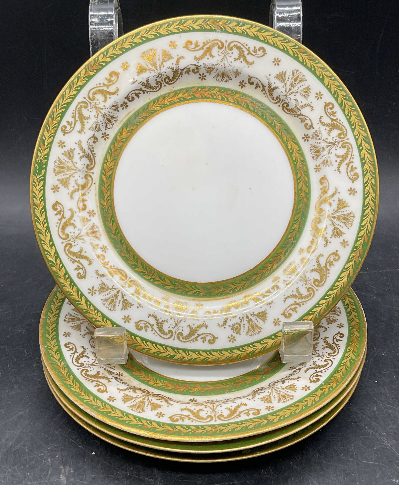 4 Antq CMC Limoges Porcelain Scroll Plates France: Set 4 antique marked CMC Maureil, Chapeau & Charles and LS & S Lazarus Straus & Sons Limoges porcelain plates. Made in France. Hand painted and gilt green borders with ornate scroll motifs. Measures a
