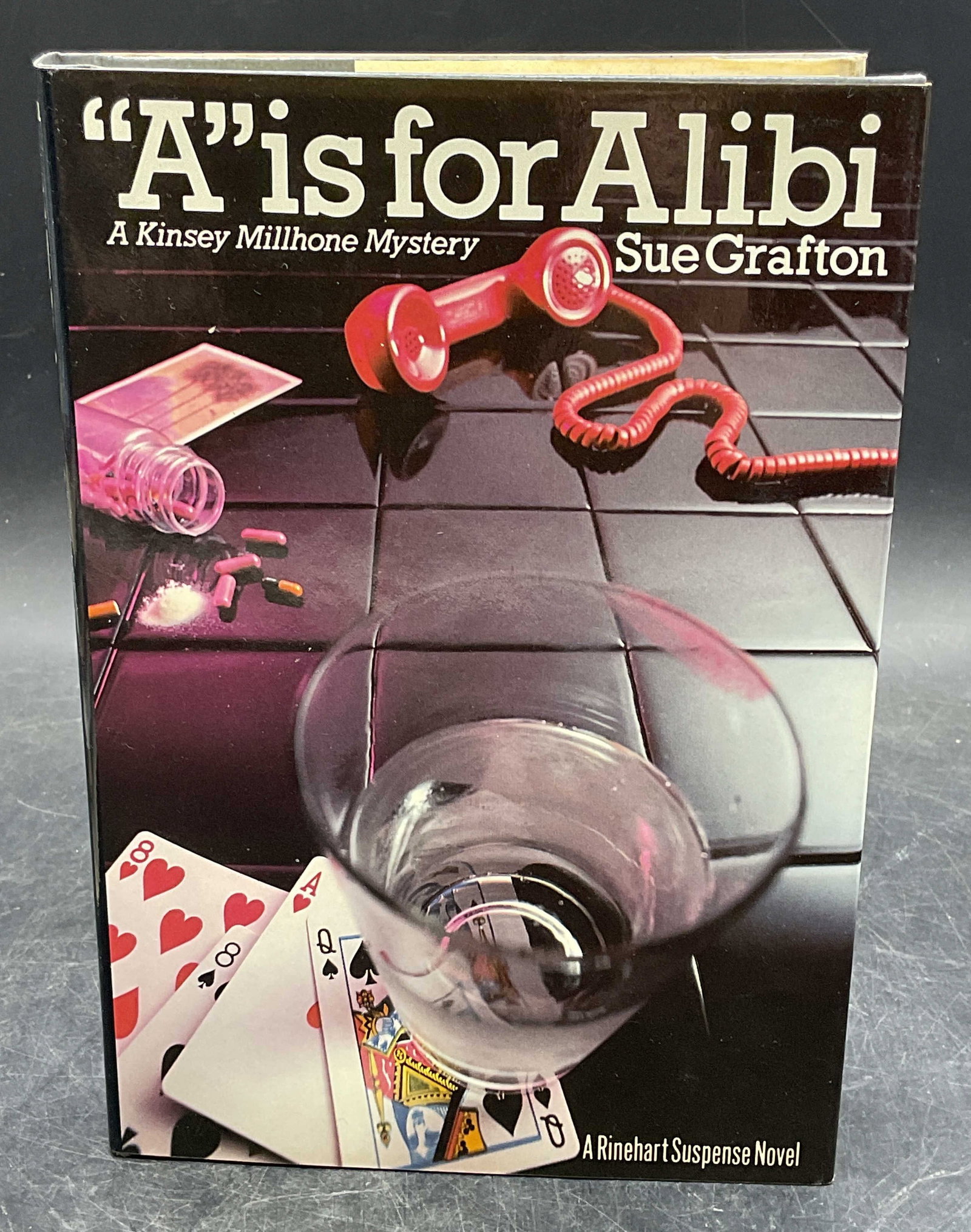1982 Sue Grafton A is for Alibi 1st Edition: Hardcover first edition copy of A is for Alibi by Sue Grafton. Holt, Rinehart, and Winston, 1982. Measures approx 8.25 x 5.75 inches. Some wear to cover, pages, and binding consistent with exposure. B