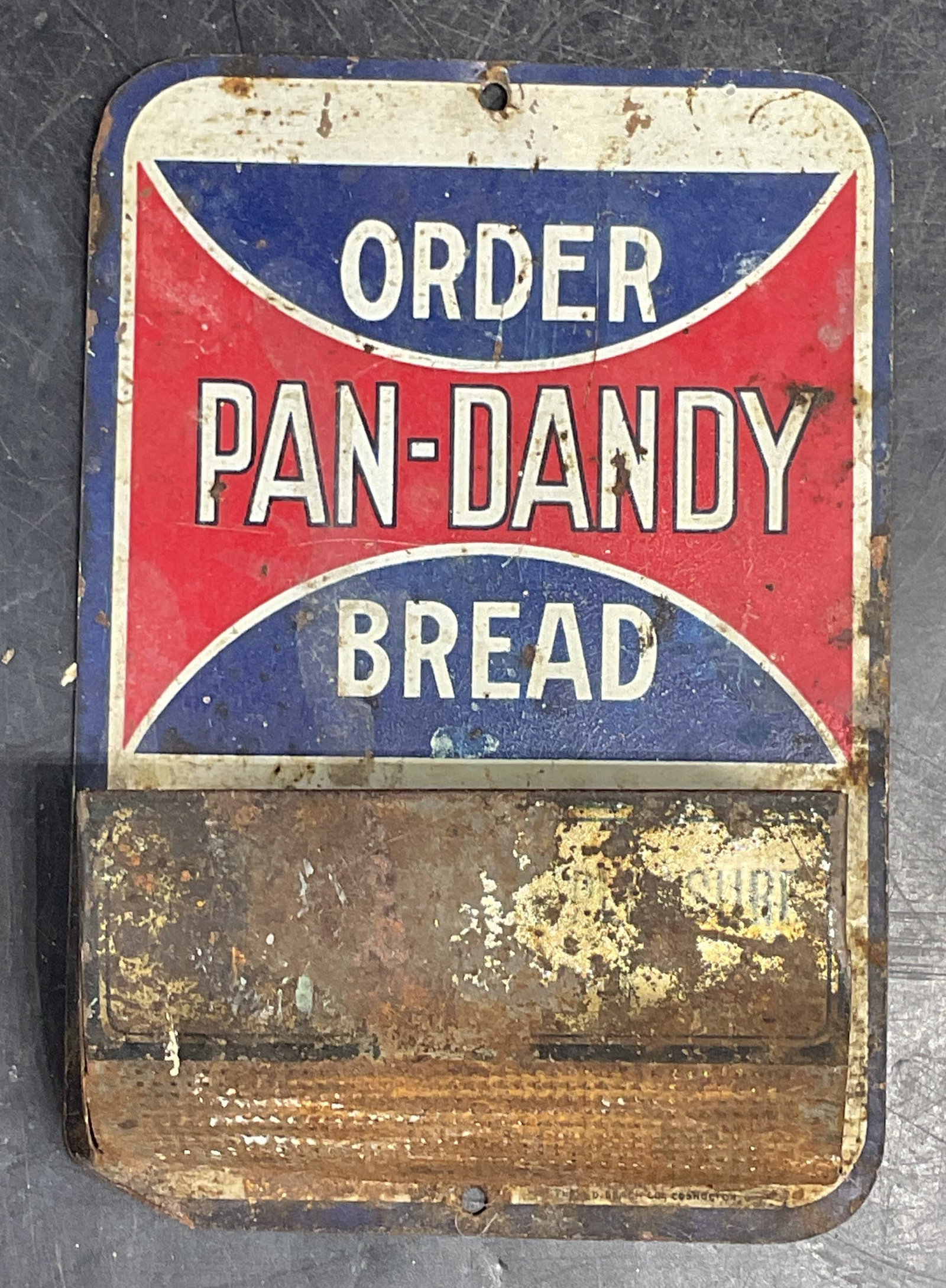 Vtg Pan Dandy Bread Match Strike Holder: Vintage tin lithograph advertising match strike/holder. Pan Dandy Bread. Measures approx. 5 x 3 3/8 inches. Wear including patina, loss to enamel, scratching, warping. Pan dandy bread match holder, ma
