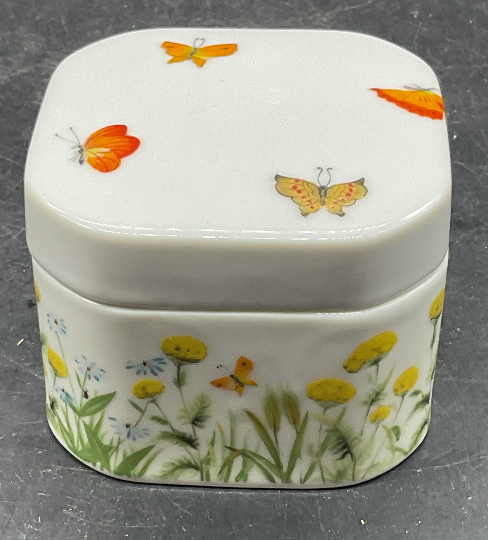 Counterpoint Floral Butterfly Ceramic Trinket Box: Counterpoint ceramic trinket box with floral and butterfly motif. Made in Japan. Measures approx. 3.25 x 3.25 x 2.5 inches. Some scratching. Counterpoint trinket box, ceramic trinket box, butterfly tr
