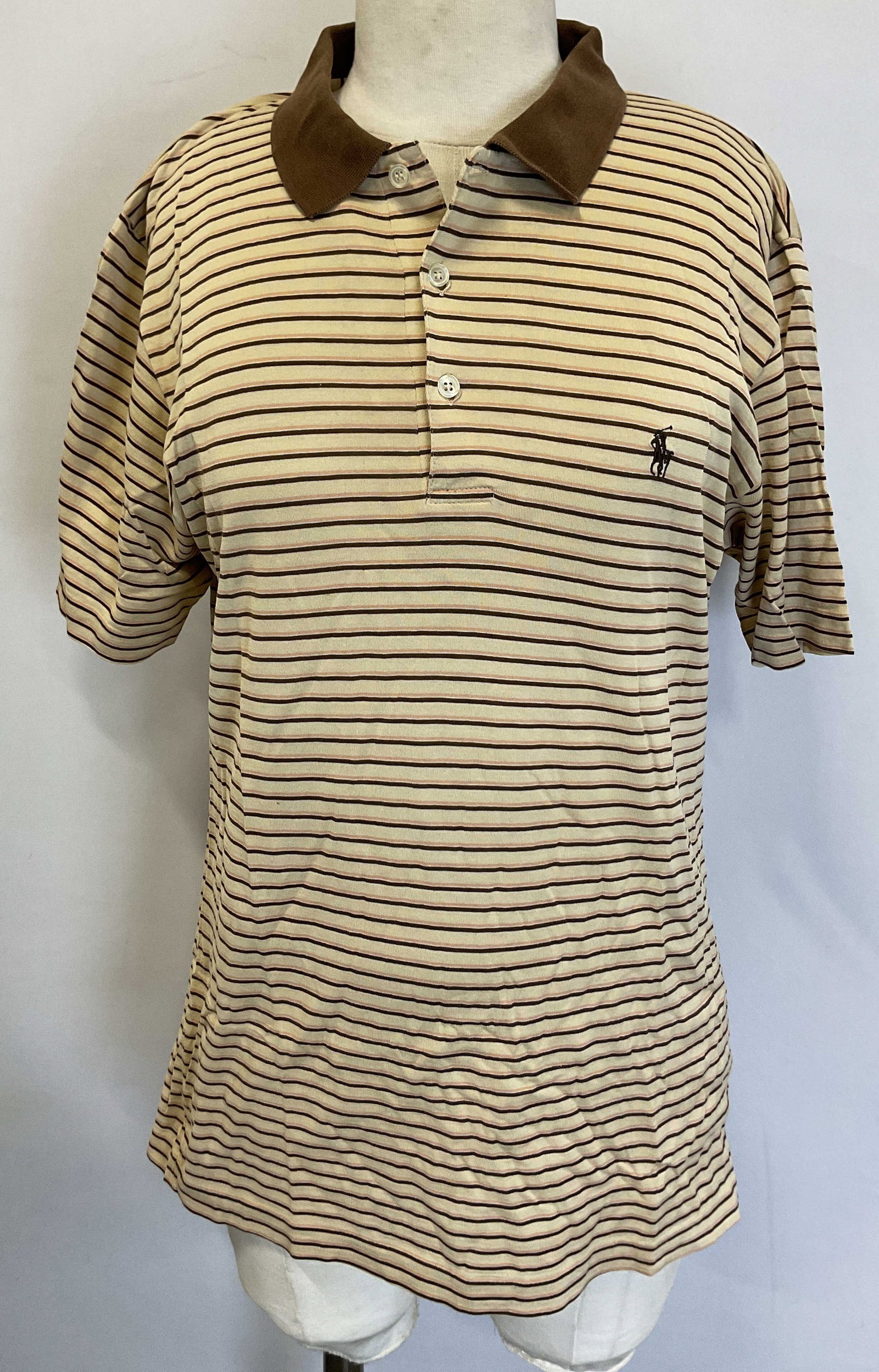 Polo Ralph Lauren Striped Polo Shirt Hong Kong: Polo Ralph Lauren striped polo shirt. Made in Hong Kong. Size L. Cotton material. Embroidered Ralph Lauren logo in brown. Brown collar. Button accents. Striped pattern in brown and beige. Wear