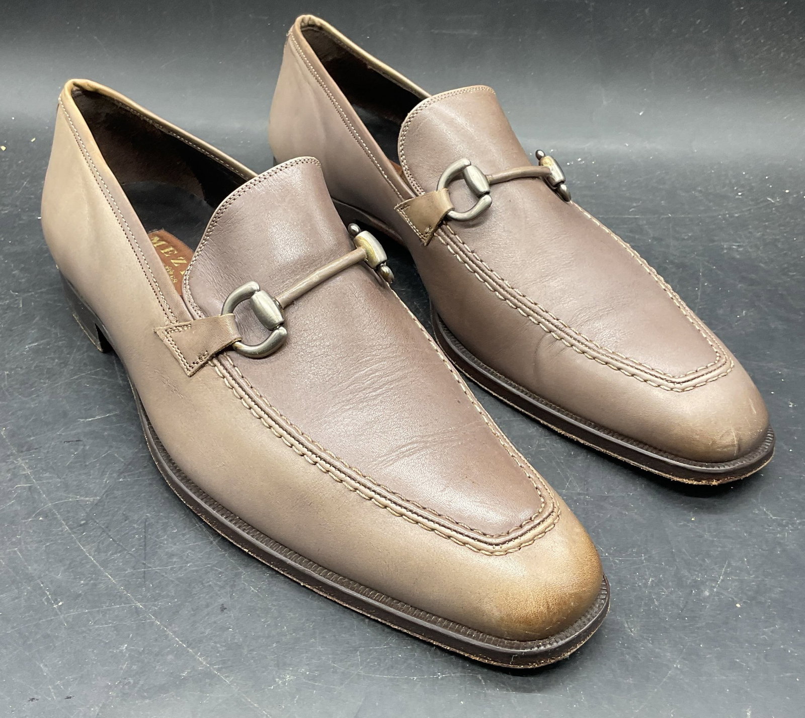 Mezlan Grey Leather Loafers, Spain: Mezlan grey leather loafers. Made in Spain. Size 9. Wear including discoloration, scratching, scuffing. Mexican shoes, designer shoes, leather loafers, grey loafers, wearables, 10 cs