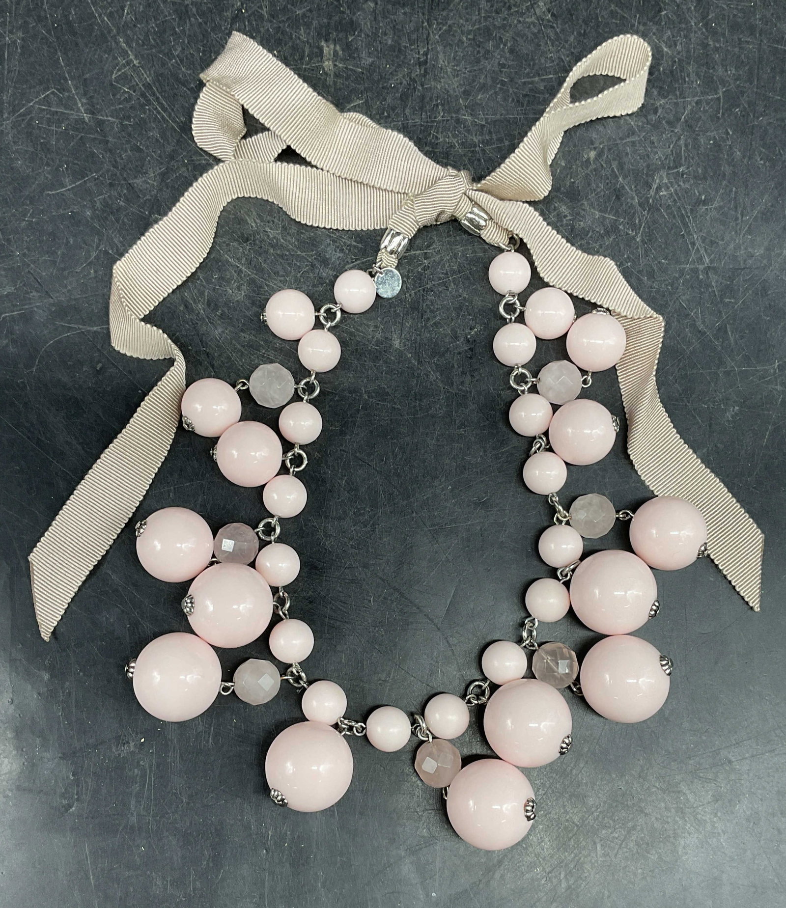 Talbots Pink Beaded Ribbon Necklace: Signed Talbots chunky pink round beaded and faux crystal necklace with taupe ribbon. Drop length measures approx. 6 inches. Some scratching. Jewelry, estate jewelry, costume jewelry, fashion jewelry, 