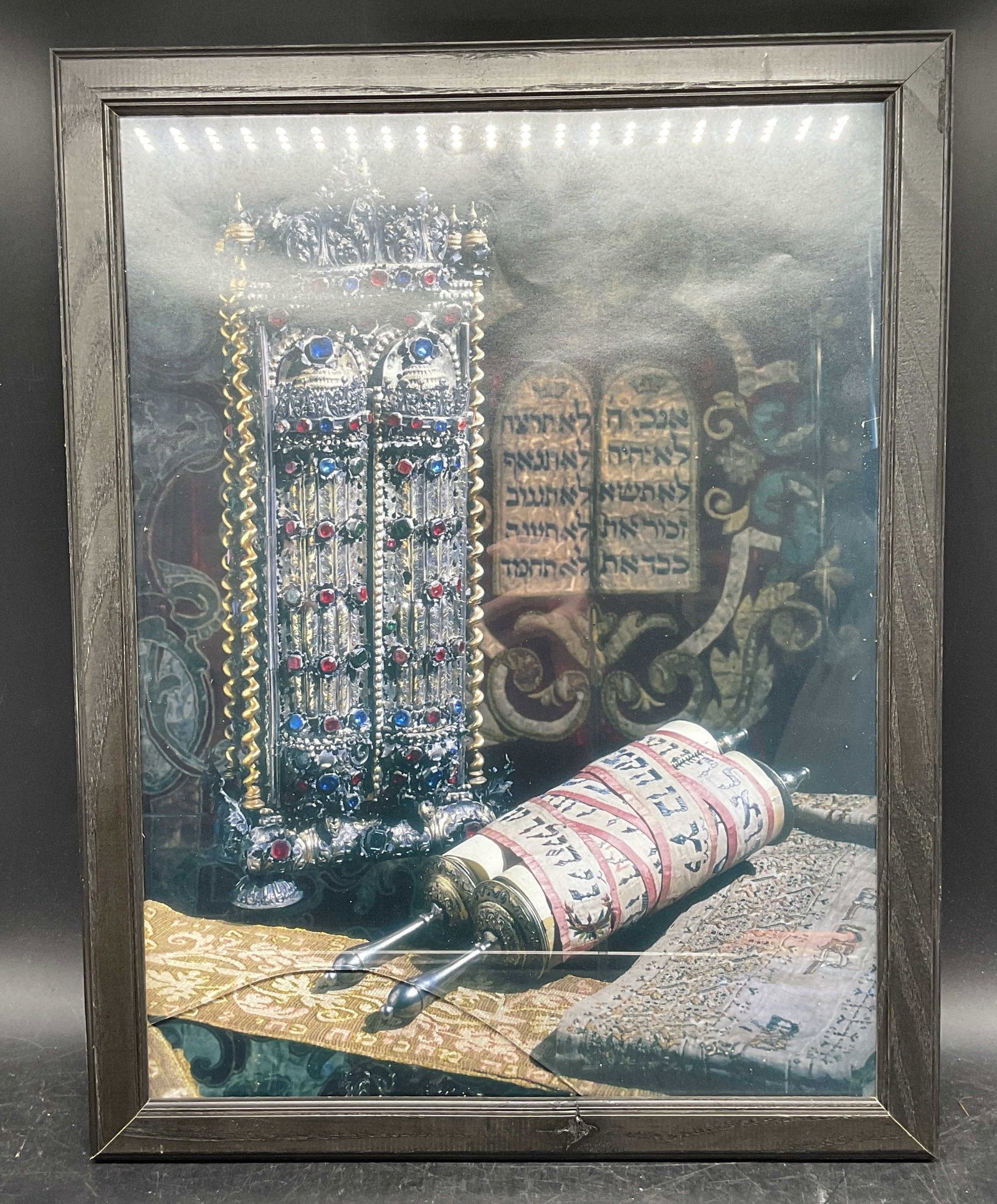 Framed Torah & Ten Commandments Lithograph: Framed lithograph. Decorative torah scroll and Ten Commandments. Judaica. Wolf frame. Not examined out of frame. Frame measures approx. 17.5 x 13.75 inches. Some wear consistent with exposure. Glass n