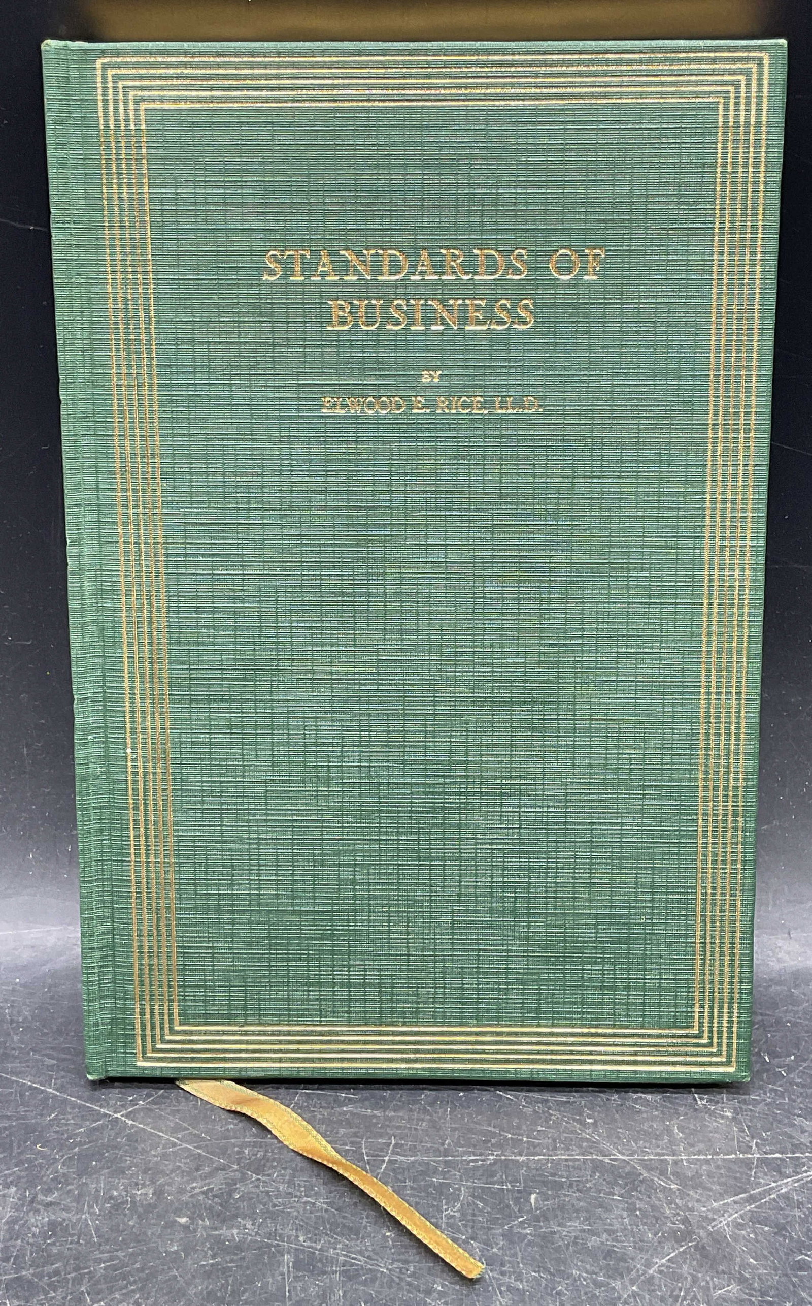 Signed Elwood Rice Standards of Business 1923: Hardcover copy of Standards of Business by Elwood E Rice. Seventeenth edition. Edition Du Luxe. Hand numbered and signed. Inscribed to Adelaide Dreier and signed by author on dedication page, addition