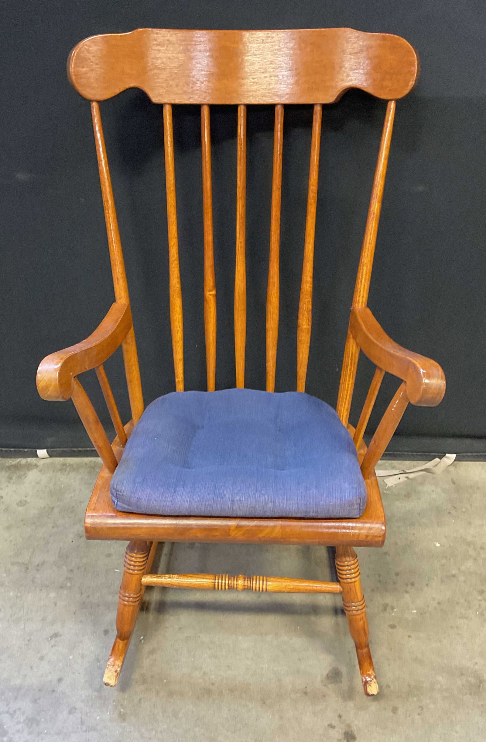 Vintage Wooden Rocking Chair with Cushion: Vintage wooden rocking chair with blue seat cushion. Measures approx. 24.5 x 17 x 41 inches. Some scratching. Rocking chair, wood rocking chair, furniture, home decor, home accessories, 10 x