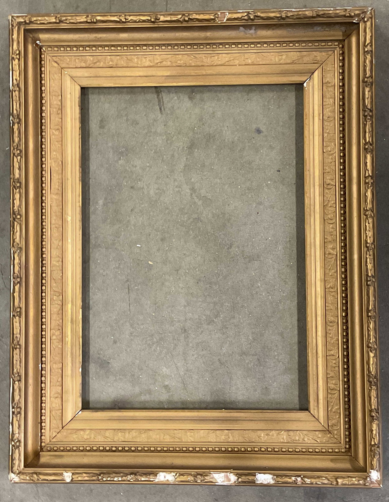 Vintage Ornate Gilt Wood Wall Frame 27 x 21 In: Vintage ornate scroll gilt wood wall frame. Measures approx. 27 x 21 inches, window measures approx. 19.25 x 13.25 inches. Wear including scratching and chipping. Ornate frame, vintage frame, wood