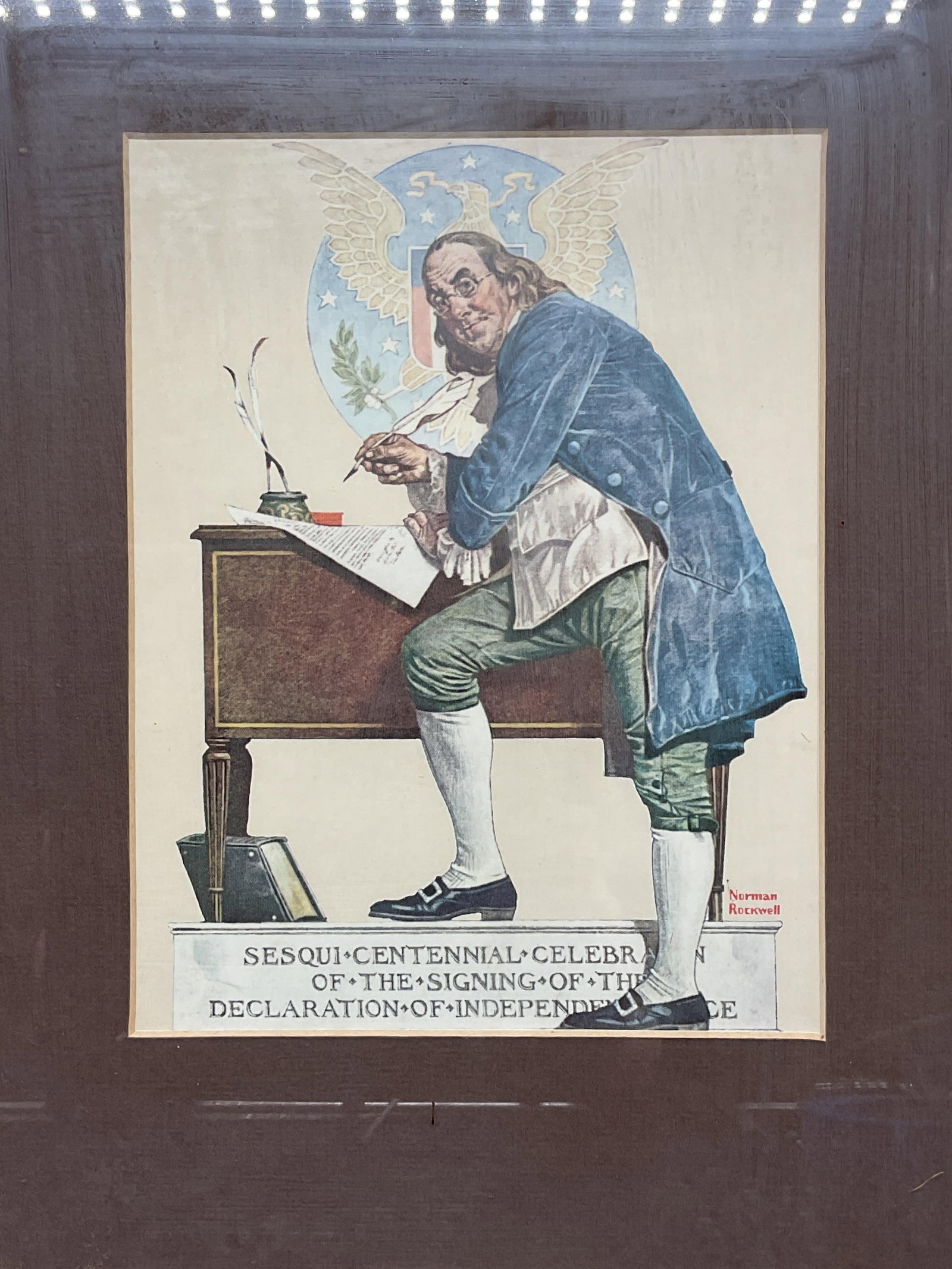 Norman Rockwell Benjamin Franklin Litho: Framed and matted lithograph. After Norman Rockwell, Ben Franklins Sesquicentennial. Silver tone metal frame. Not examined out of frame. Frame measures approx. 14.25 x 11.25 inches. Some wear
