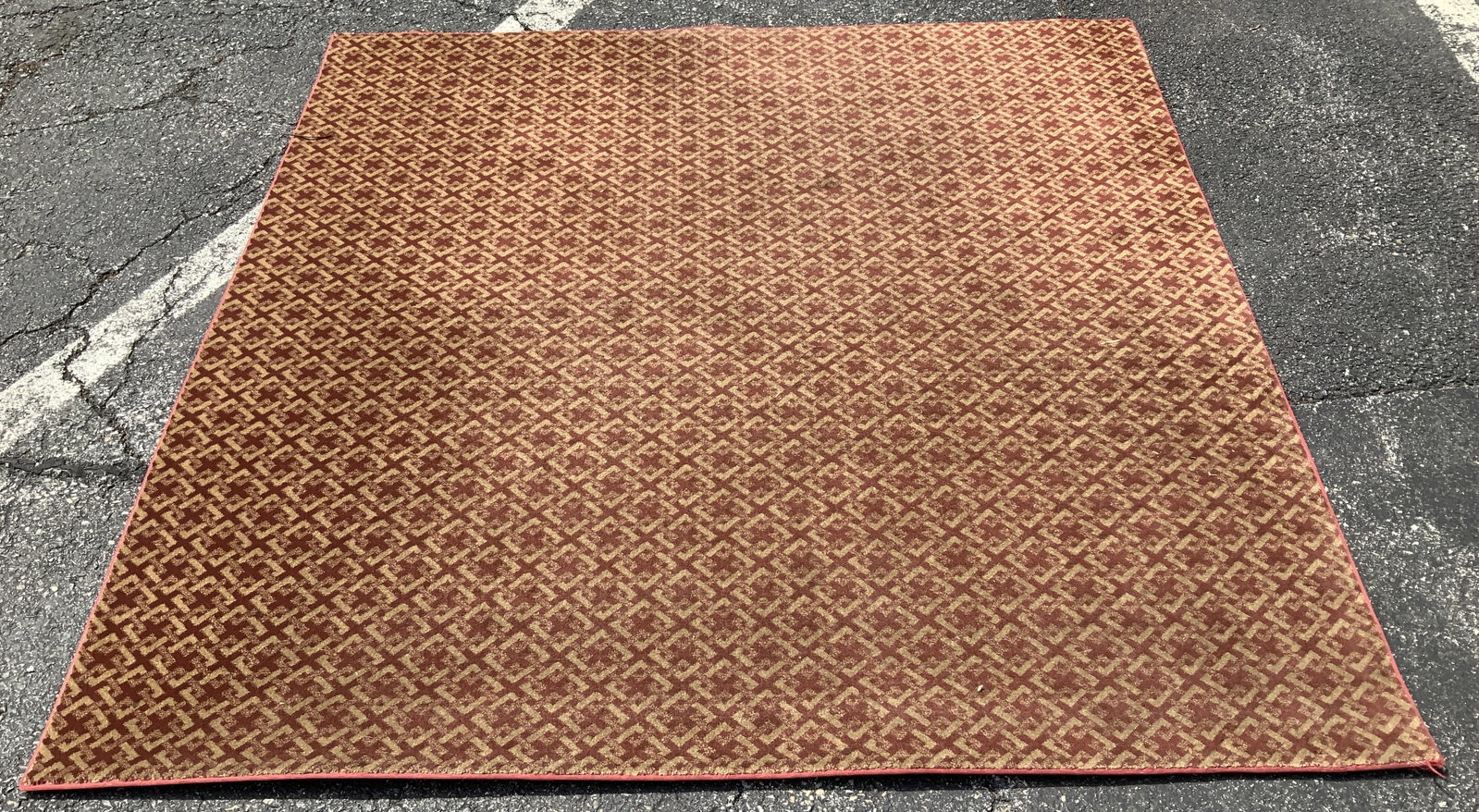 Vtg Red & Beige Geometric Rug: Vintage rug is red & beige like toned. Features a distinctive geometric pattern. Possibly synthetic. Surface wear consistent to age, use & exposure. Measurements: length 72in x width 72in. Vintage