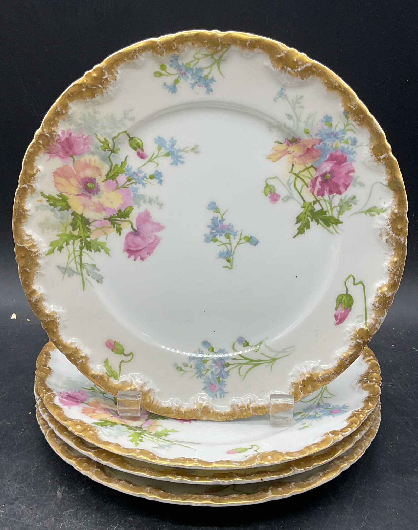 4 Vtg Field HAVILAND Limoges Porc Plates France: Set of 4 vintage, possibly antique CH Field HAVILAND GDA Limoges porcelain plates. Made in France. Hand painted and gilt with floral motifs. Measures approx. 8.25 inches wide. Some scratching and loss