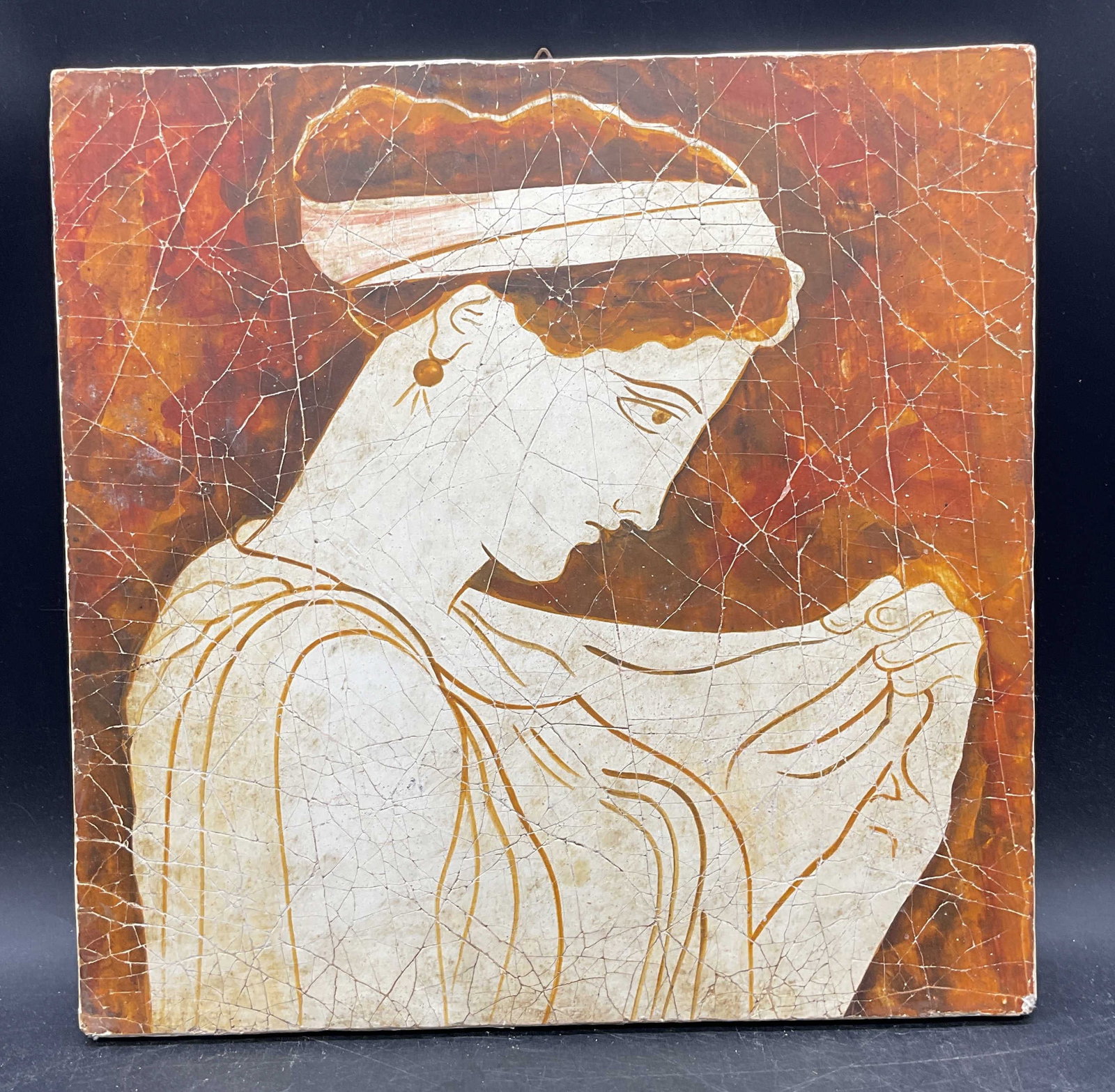 Classical Greek Young Woman Fresco Panel: Reproduction from a Classical Period Attic work. Made in Greece. Inscribed on the verso. Fresco on wood panel. Portrait of a young woman. Measures approx. 12 x 12 inches. Some scratching and loss to p