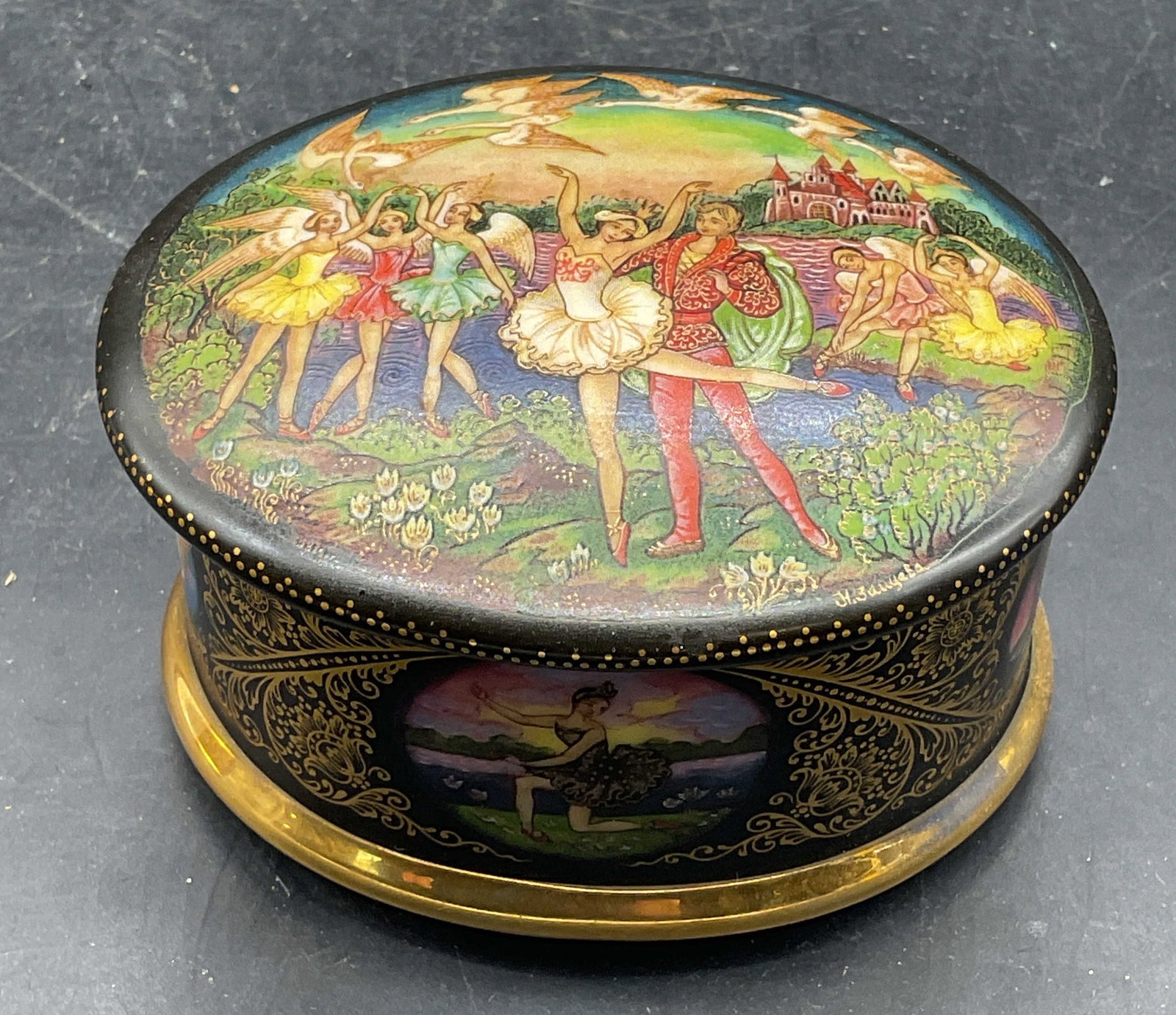 Ardleigh Elliot Porcelain Russian Ballet Music Box: Vintage Ardleigh Elliot & Sons porcelain music box. Hand painted and gilt Russian ballet motif. Measures approx. 3.75 x 3 x 2 inches. Some scratching. Not tested. Mechanism on interior loose. Ardleigh