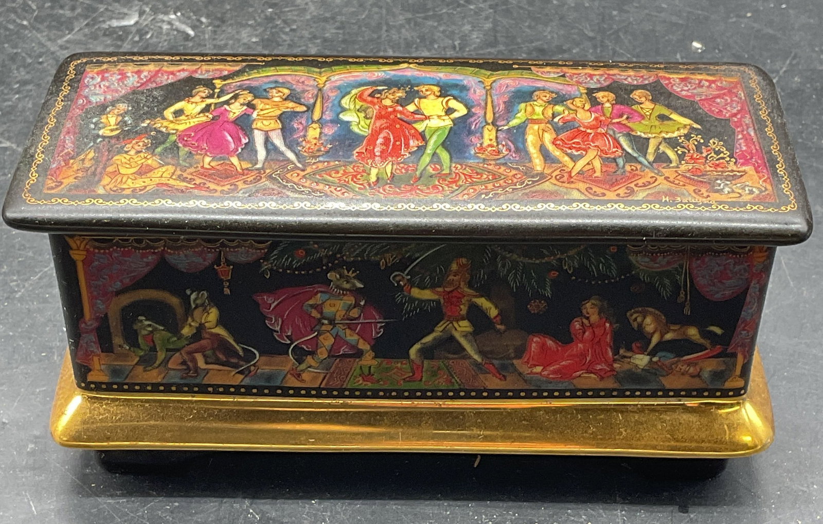 Ardleigh Elliot Porcelain Russian Dance Music Box: Vintage Ardleigh Elliot & Sons porcelain music box. Hand painted and gilt Russian dance motif. Measures approx. 4.75 x 2 x 2.25 inches. Some scratching. Not tested. Ardleigh Elliot music box, porcelai