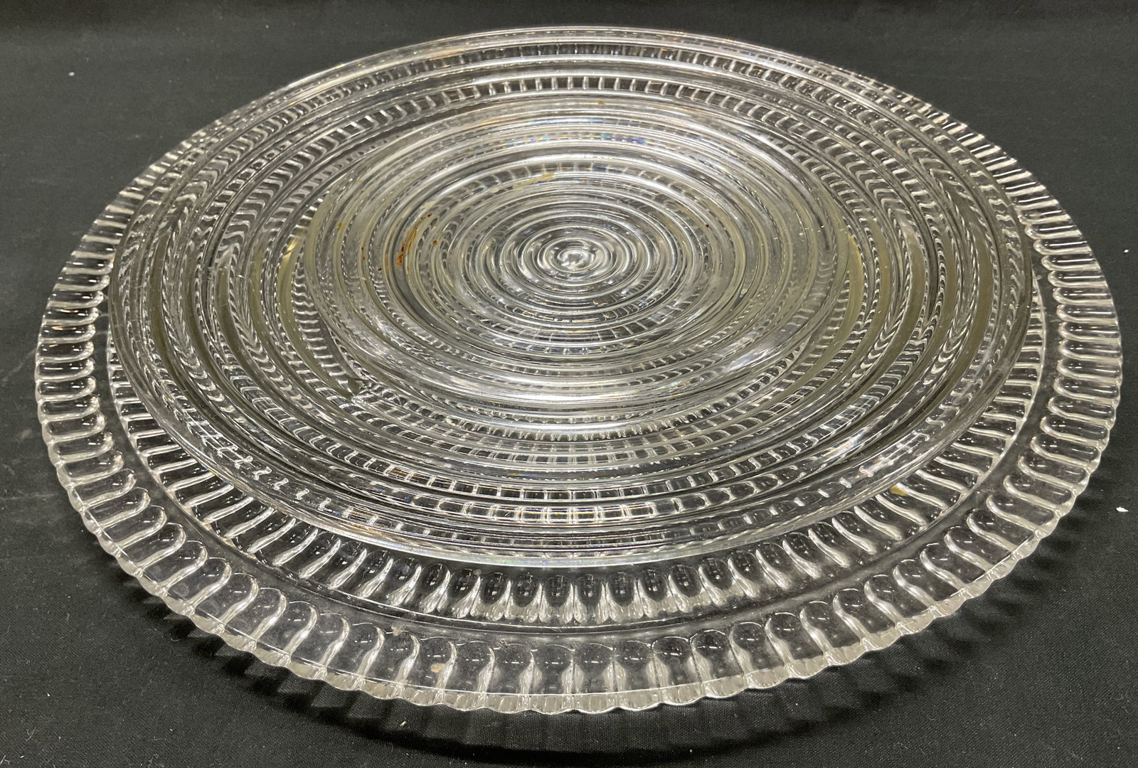 Lot 3 Vintage Glass Platters: Lot of 3 vintage glass platters. Round platters. Swirled pattern and ribbed surface. Size vary. Measures approx 12 inches in diameter. Scratching. Platters, tableware, home decor, table decor, decor, 