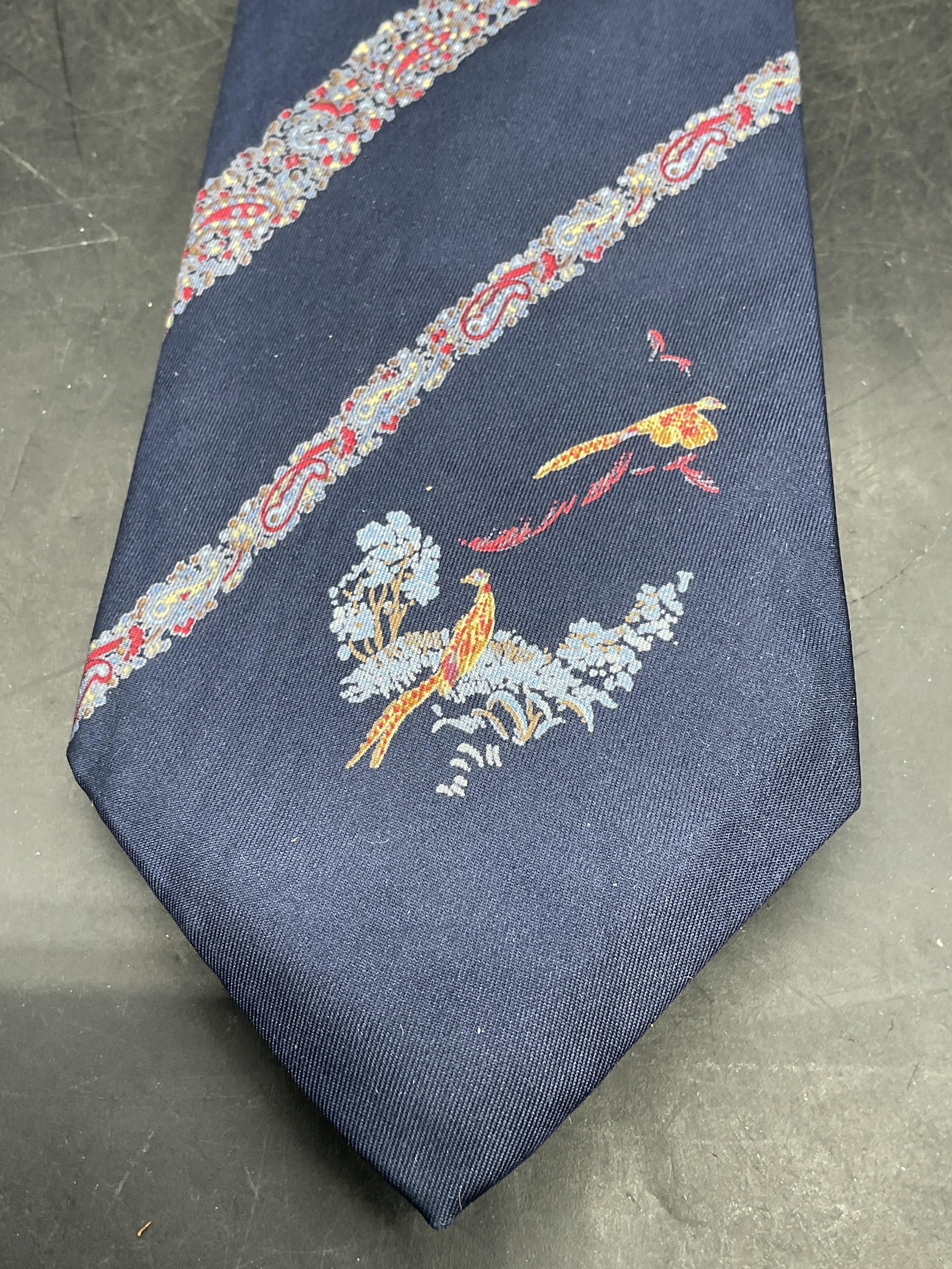 Vintage Berkley Blue Silk Paisley Bird Tie: Vintage Berkley blue silk tie with paisley and bird print. Measures approx. 54 inches. Some blemishes. Tie, silk tie, designer tie, menswear, accessories, fashion accessories, Berkley tie, blue tie, p