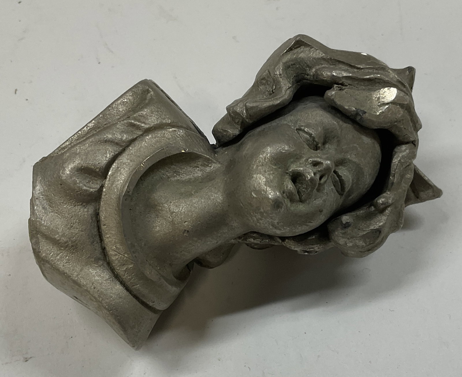 Vintage Spelter Hollow Portrait Bust: Vintage Spelter Hollow Portrait Bust. Depicts a Woman Sleeping. Front and Back are Detached. Measures app 3.5in H x 2in W. Vintage Figurine, Spelter Figurine, Hollow Portrait Bust, Bust Figurine, Woma