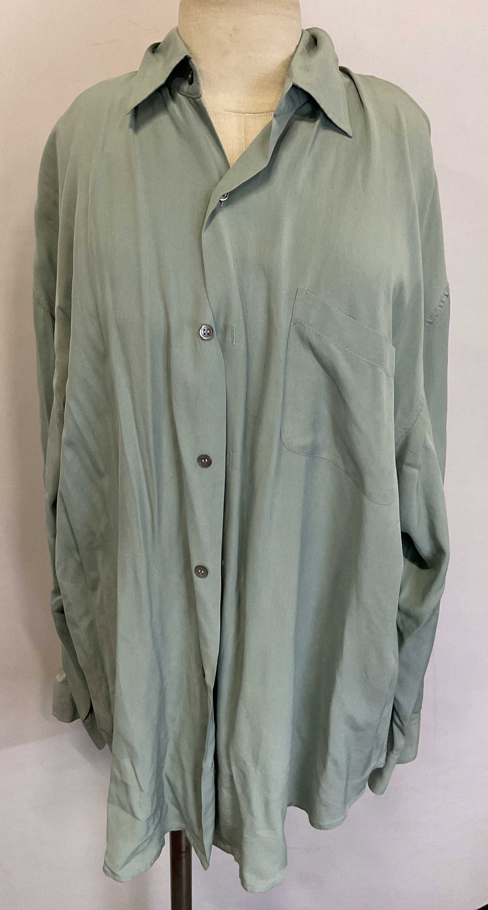 Barneys Blue Silk Long Sleeve Button Down: Barneys New York blue silk long sleeve button down. 100% silk. Size M. Collared, front pocket, buttoned. Wear consistent with exposure. Button down, Barneys, top, wearables, clothing, outerwear,