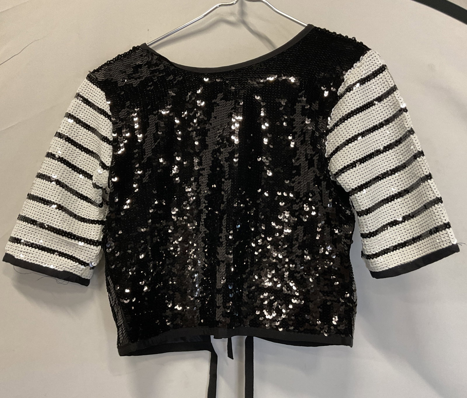 Zara Black & White Sequined Top NWT: New with tag. Zara black and white sequined top. Size S. Striped black and white pattern with sequins. Ties in back. Never worn. Top, blouse, Zara, wearables, clothing, outerwear, fashion. 4H