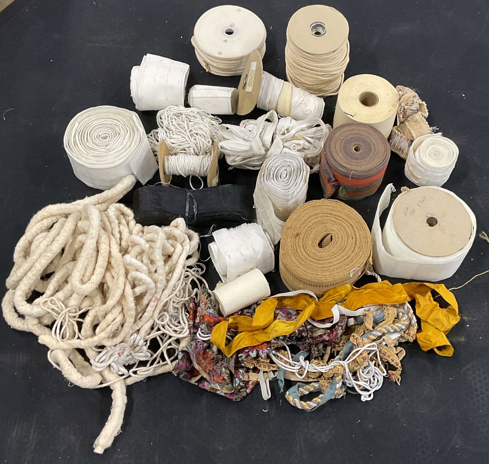 Group Lot White Trims & Sewing Materials: Large group lot of assorted trims and sewing materials in primarily white. Not examined individually. Not measures, yardage unknown. Sold as is. All pieces may have wear consistent with exposure,