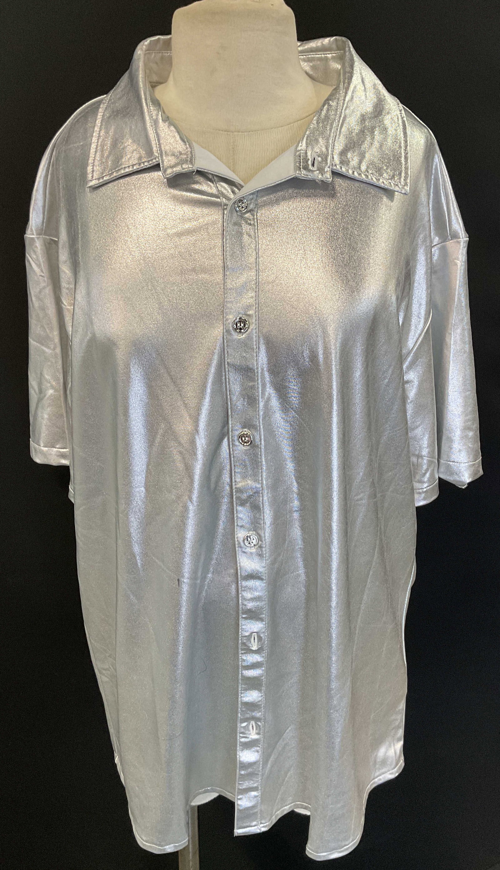Jogal Metallic Silver Toned Buttoned Top: Jogal metallic silver toned buttoned top. Size XXL. Short sleeve. Collared and buttoned. Wear consistent with exposure, blemishes. Top, shirt, Jogal, wearables, clothing, outerwear, fashion. 4H