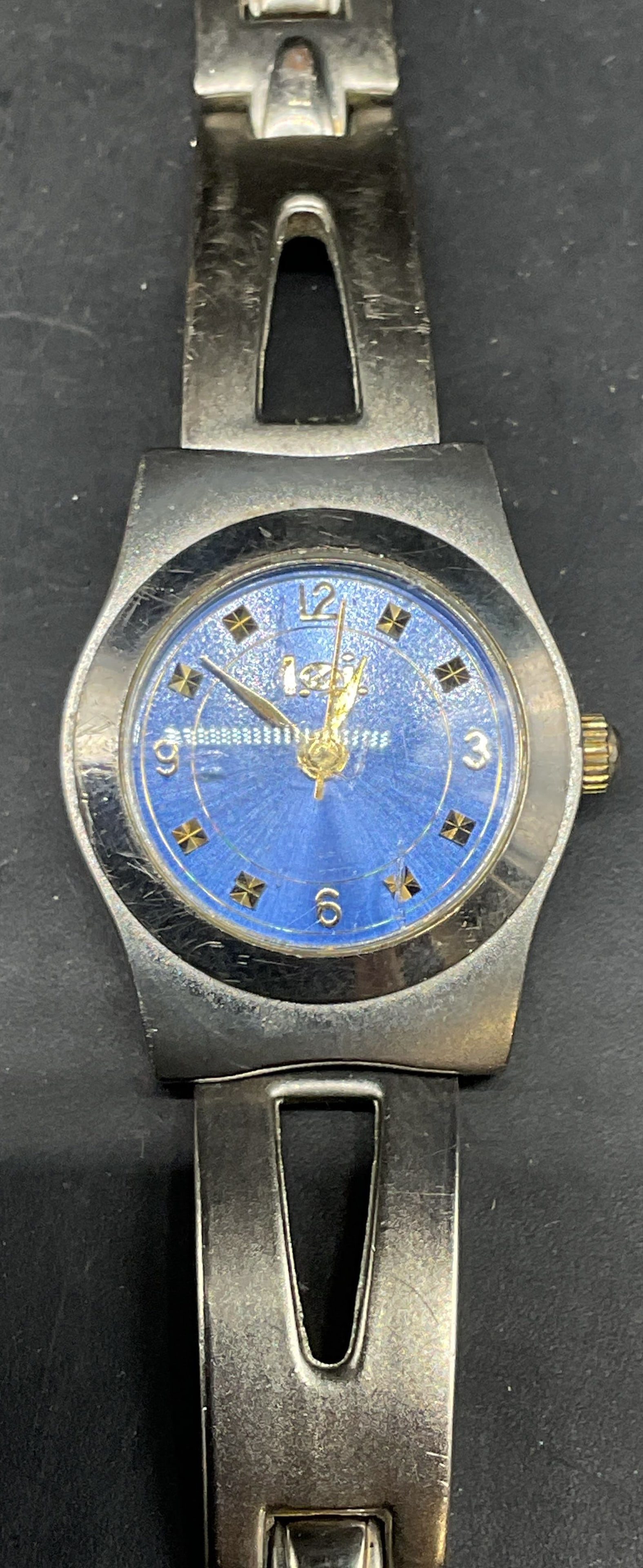 Lei Silver Tone Blue Watch: Lei silver tone watch with blue dial. Measures approx. 7 inches long. Not tested. Some scratching. Jewelry, estate jewelry, costume jewelry, cocktail jewelry, fashion jewelry, accessories, fashion